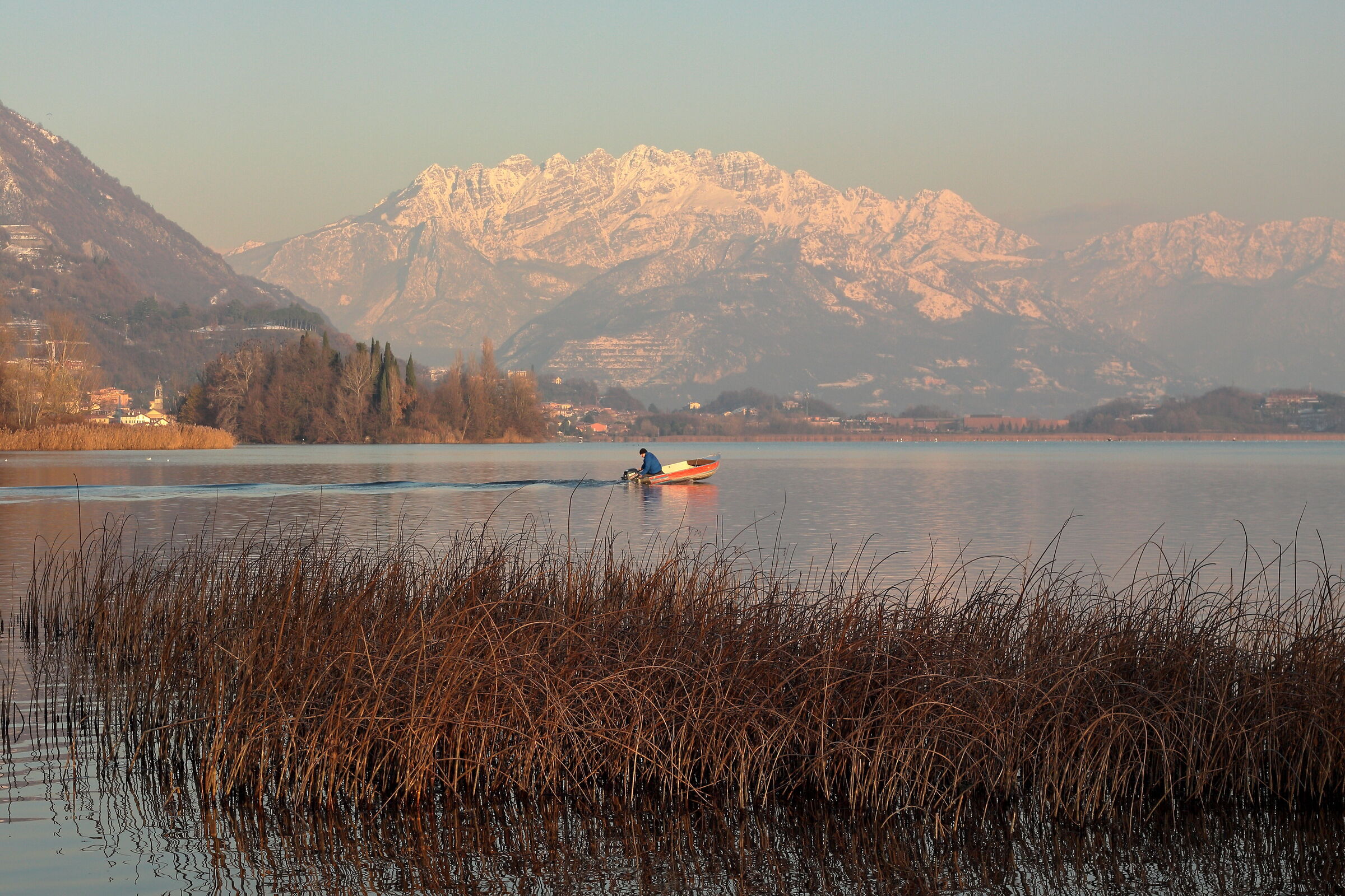 The lake, the fisherman, the Resegone