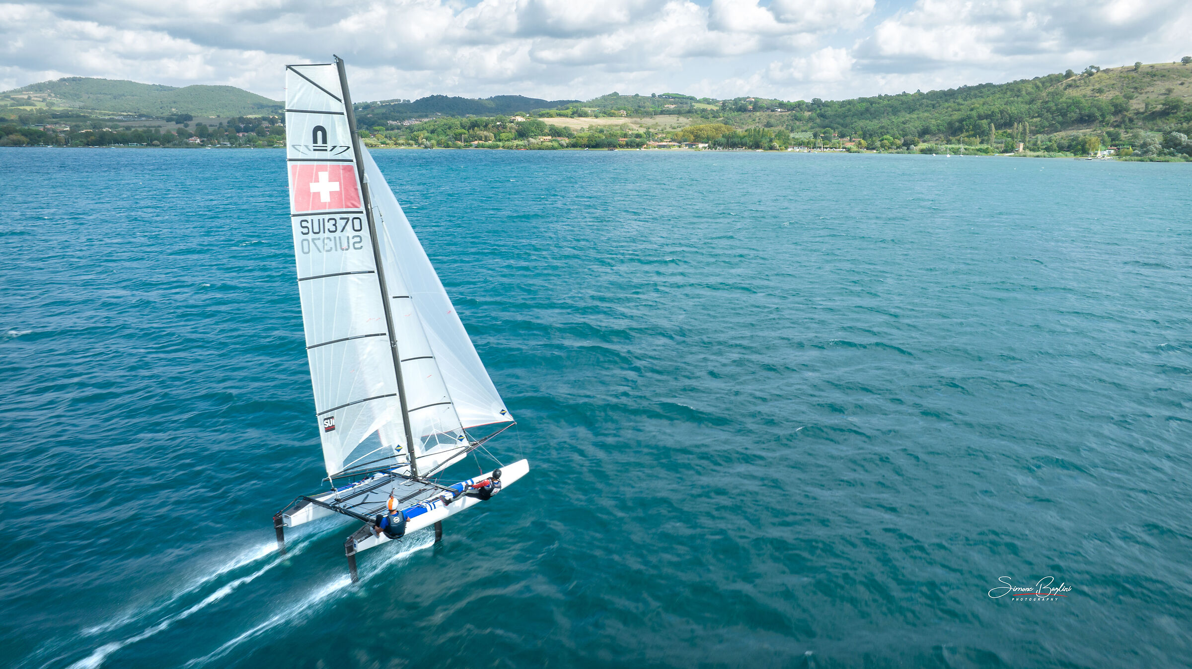 Nacra 17 foiling on lake