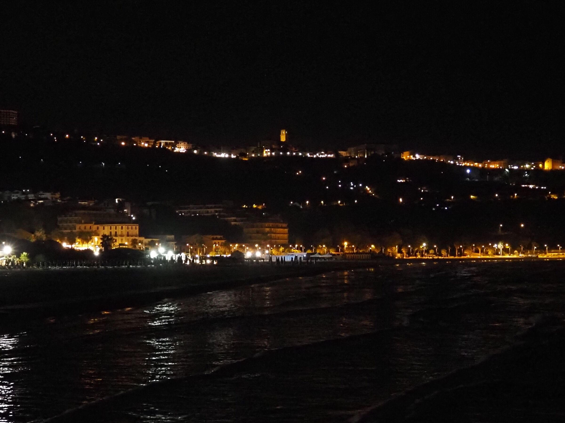 The lights of the city from the sea