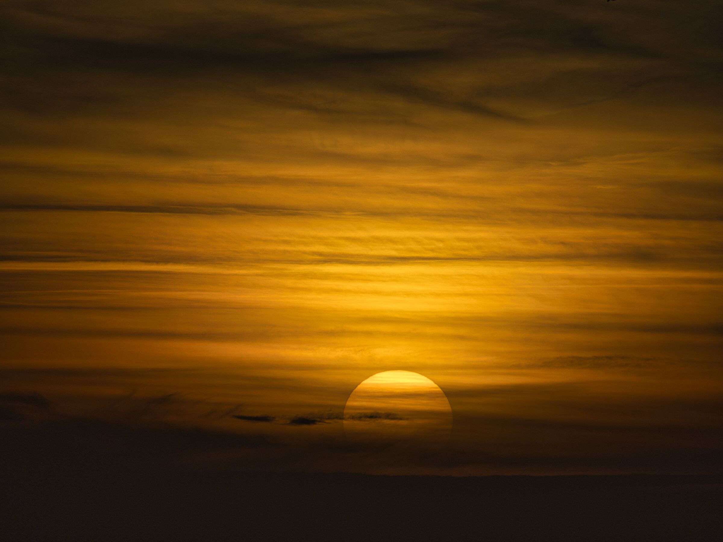 When the sun dips into the clouds...