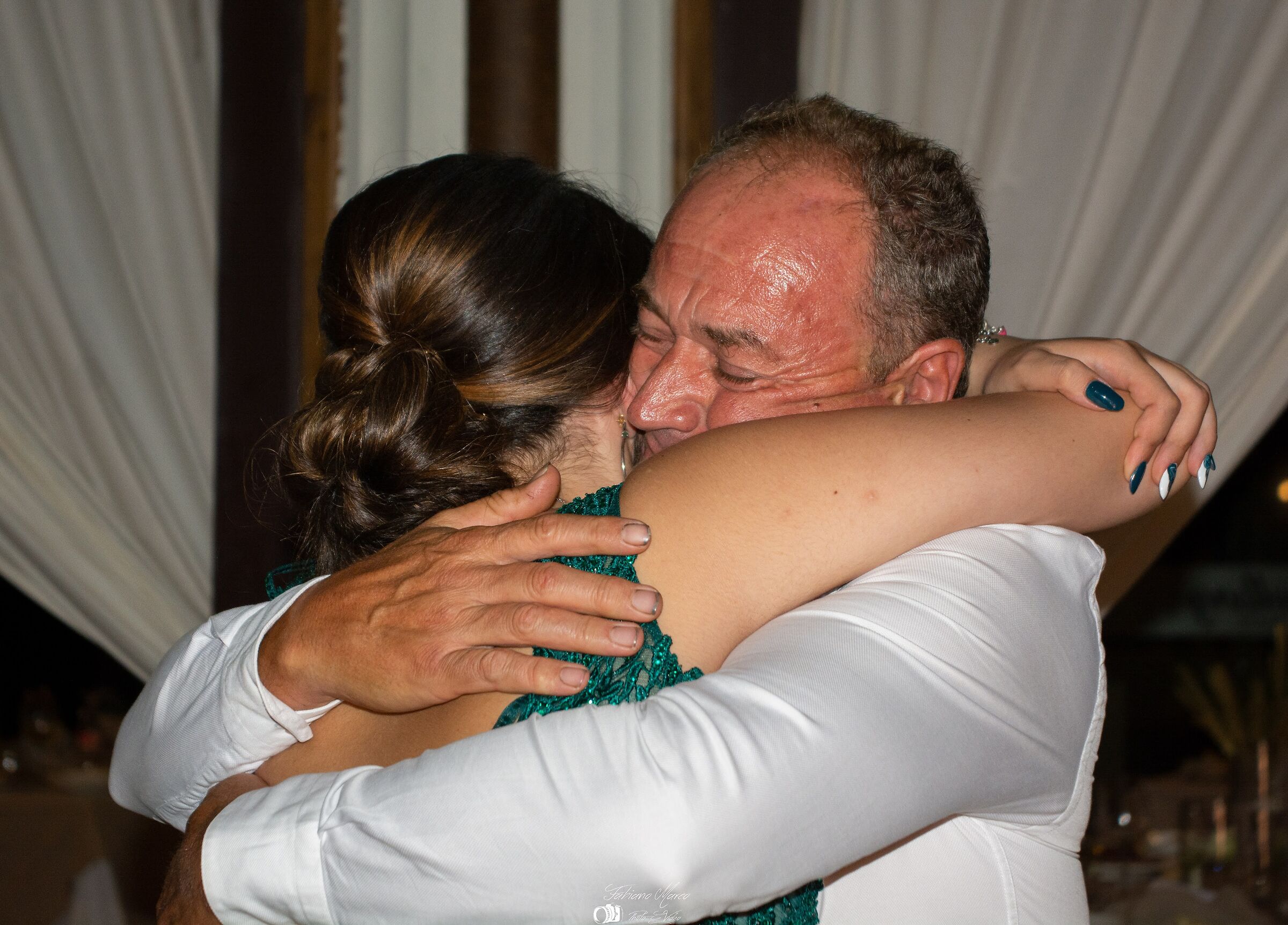 The embrace of a father and a daughter