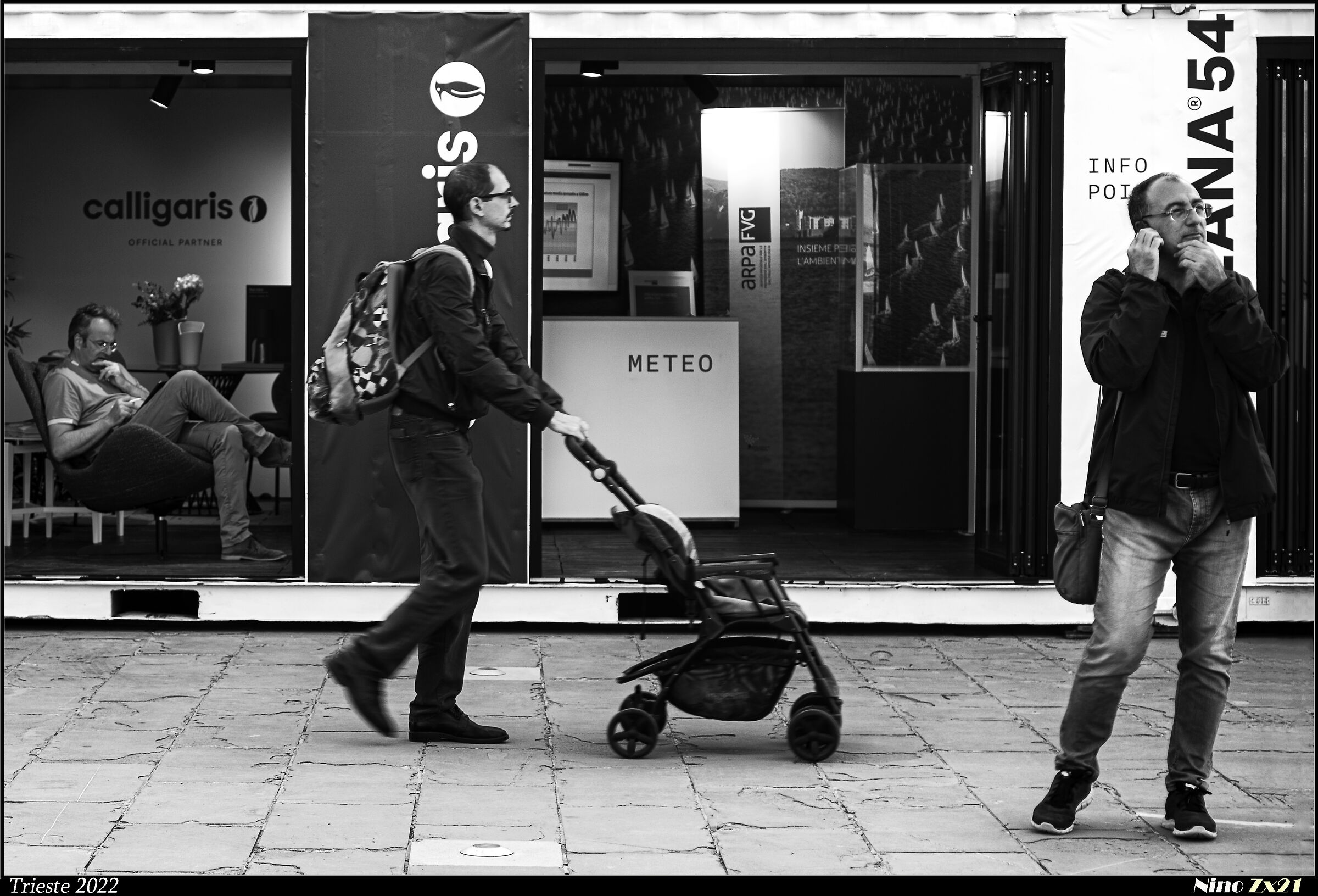 Three men and a stroller.