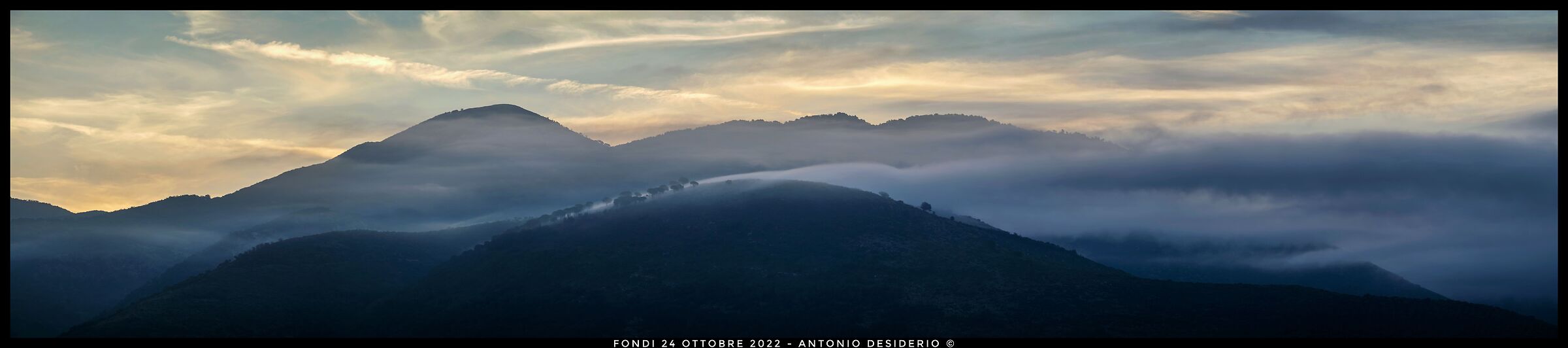 The fog at the bristling hills....