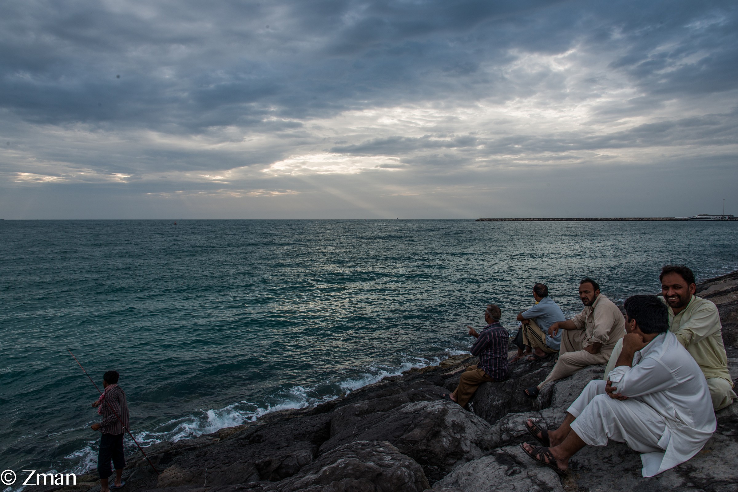 Enjoying Sunset On the Breakwater
