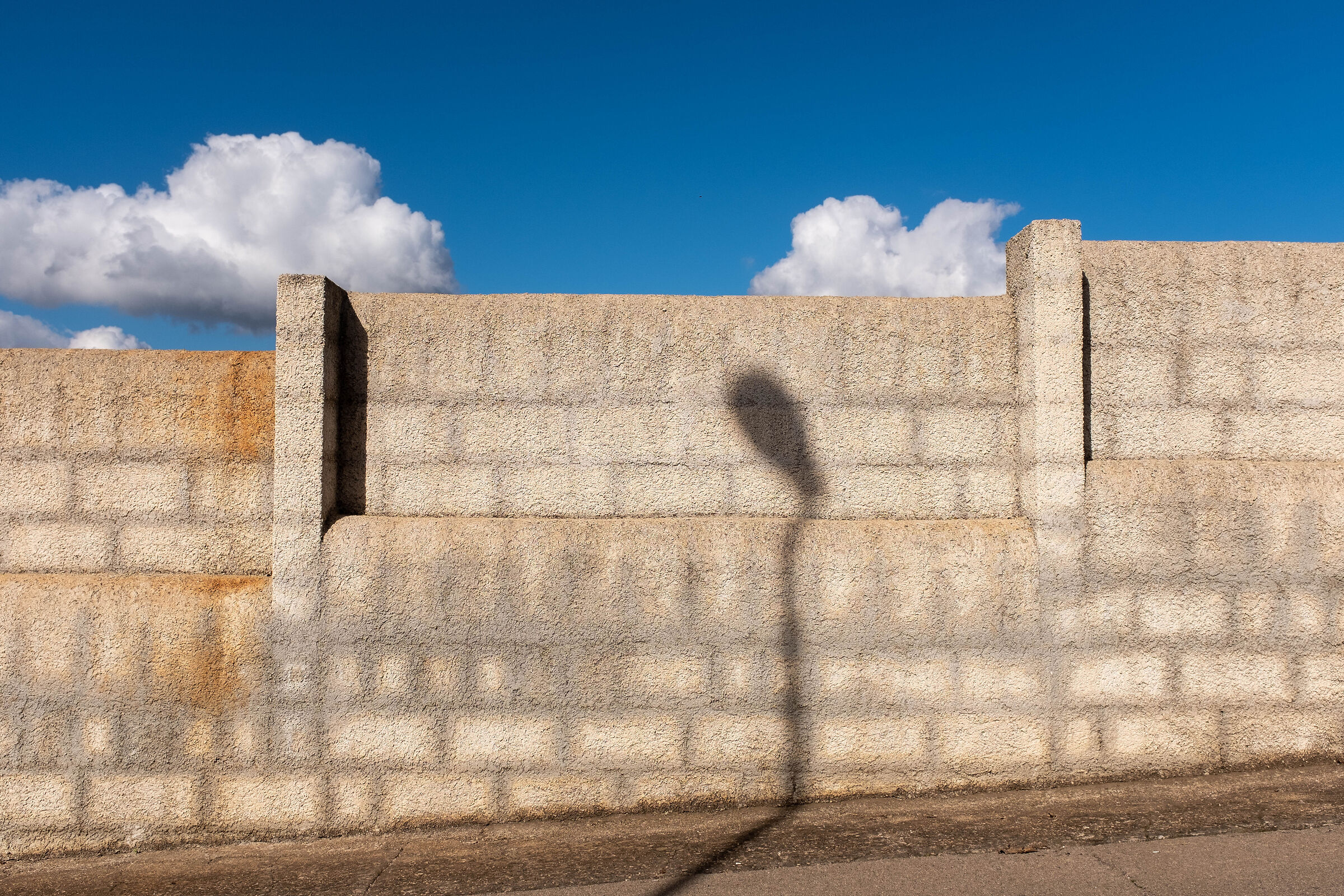 The shadow of the street lamp