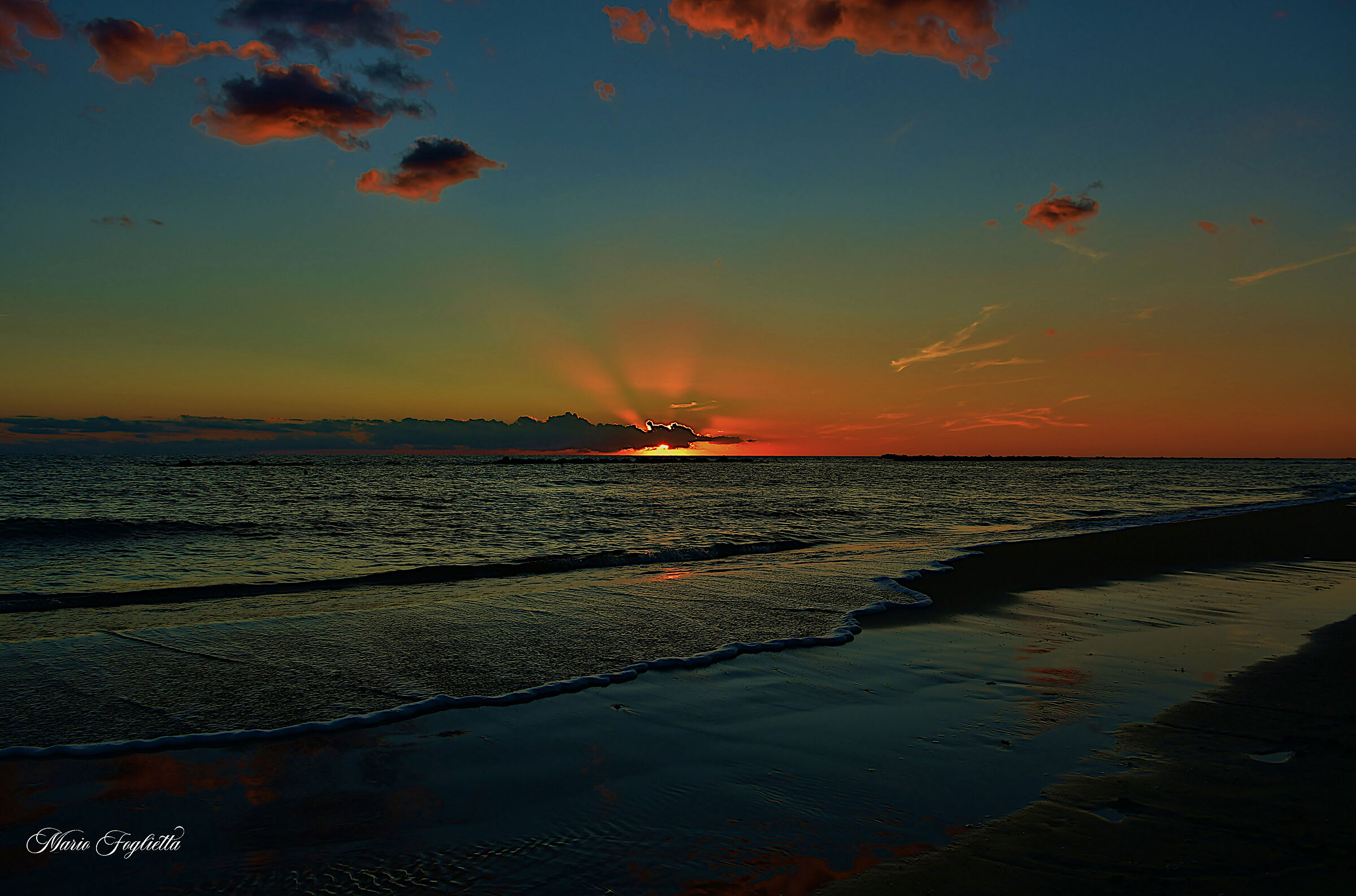 Ti invito a sorridere al tramonto....... offro io.