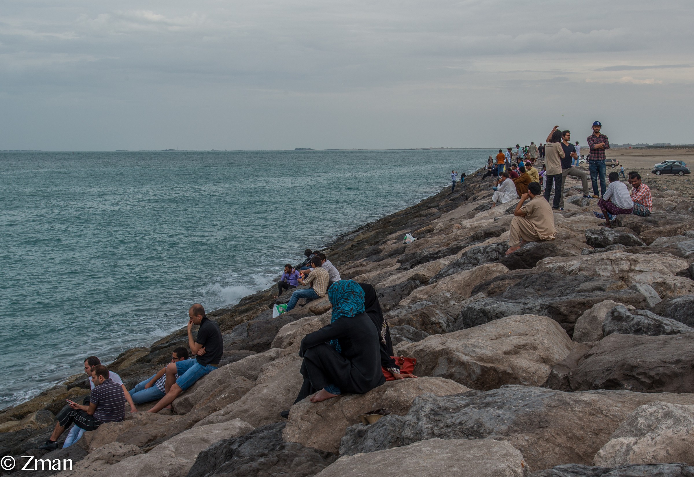 People, Rocks and The Sea