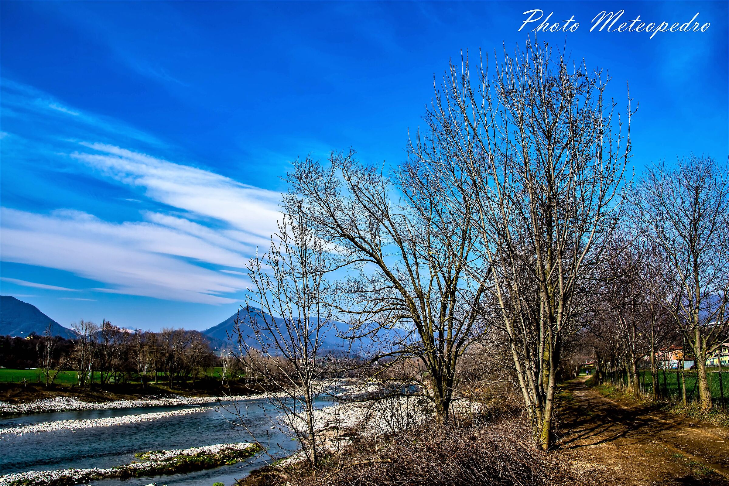 along the banks of the Brembo river