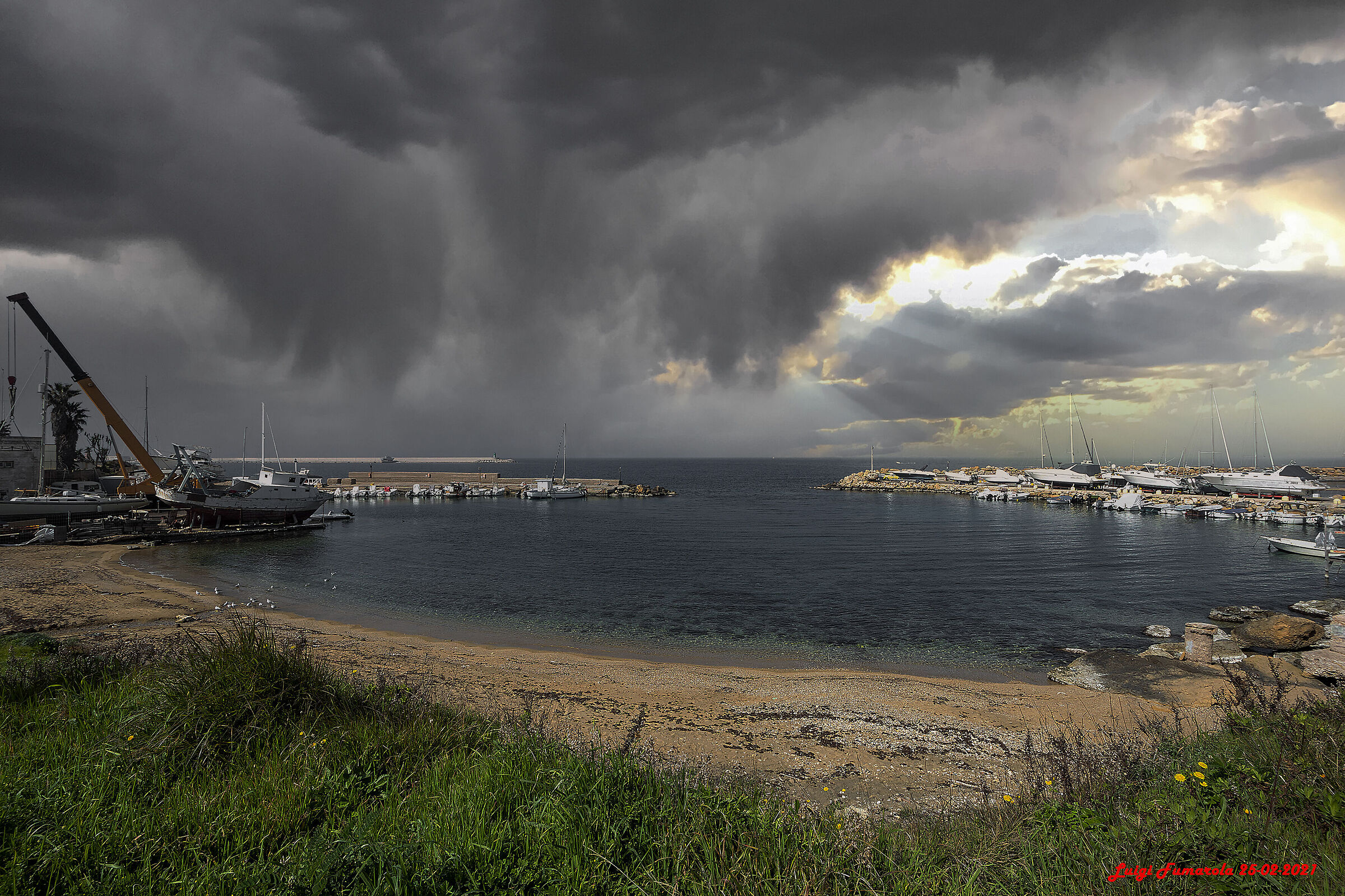 Ray of sunshine through a gash of clouds