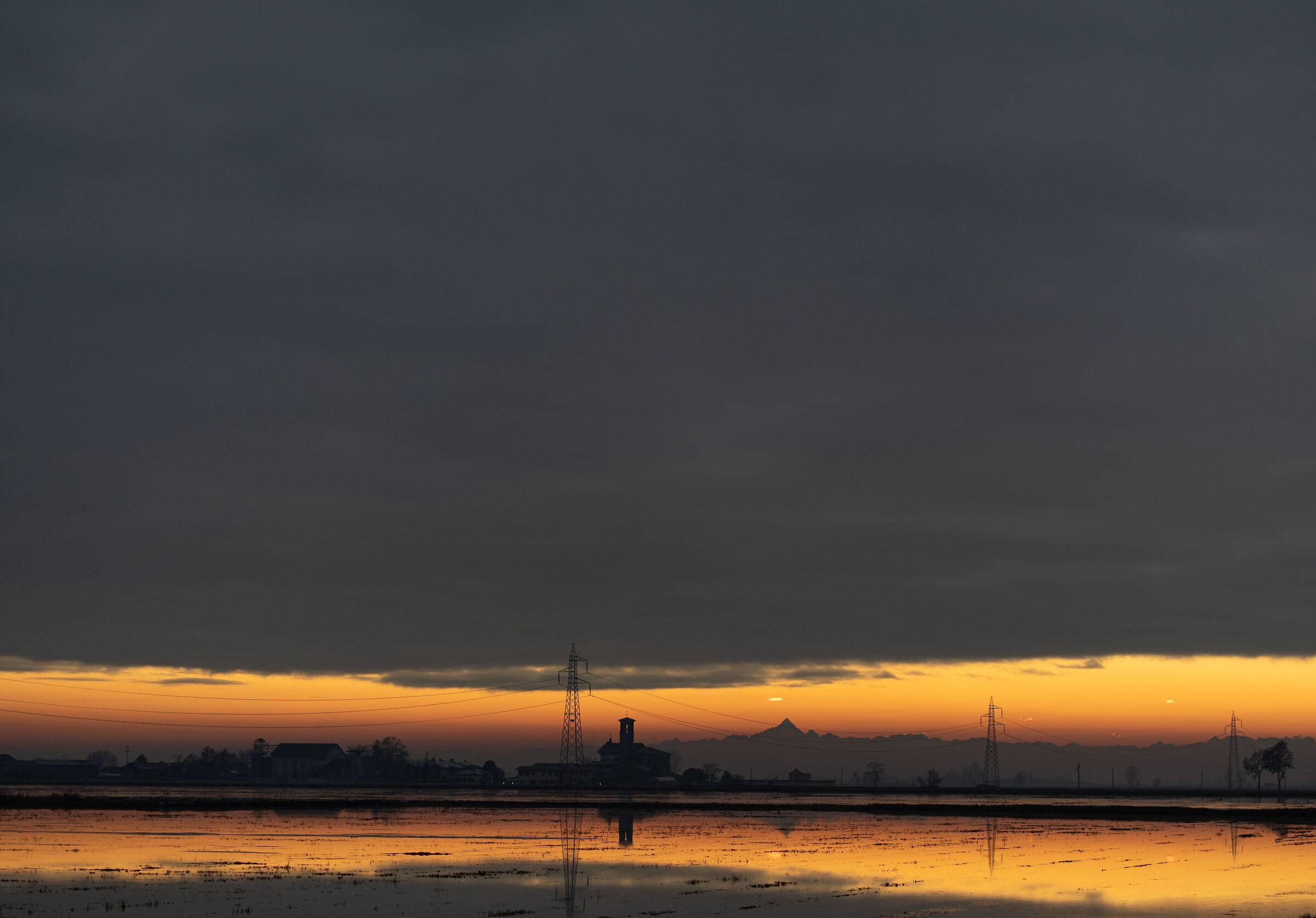 Sunset on Monviso and winter submersions