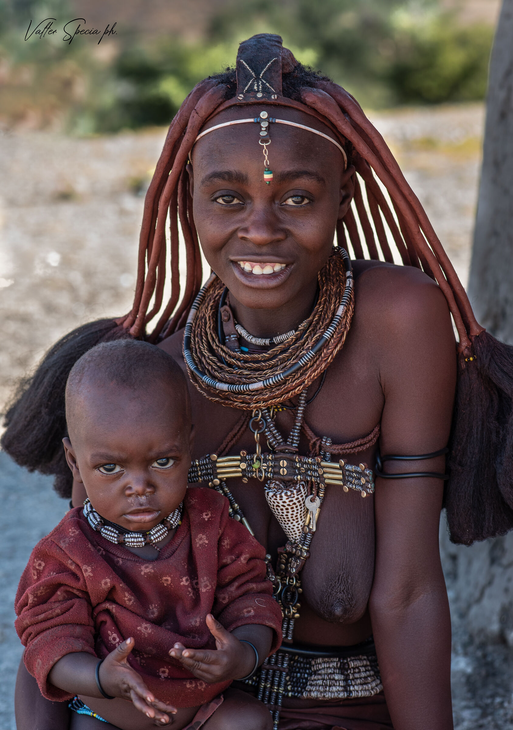 Himba girl with son, Namibia,
