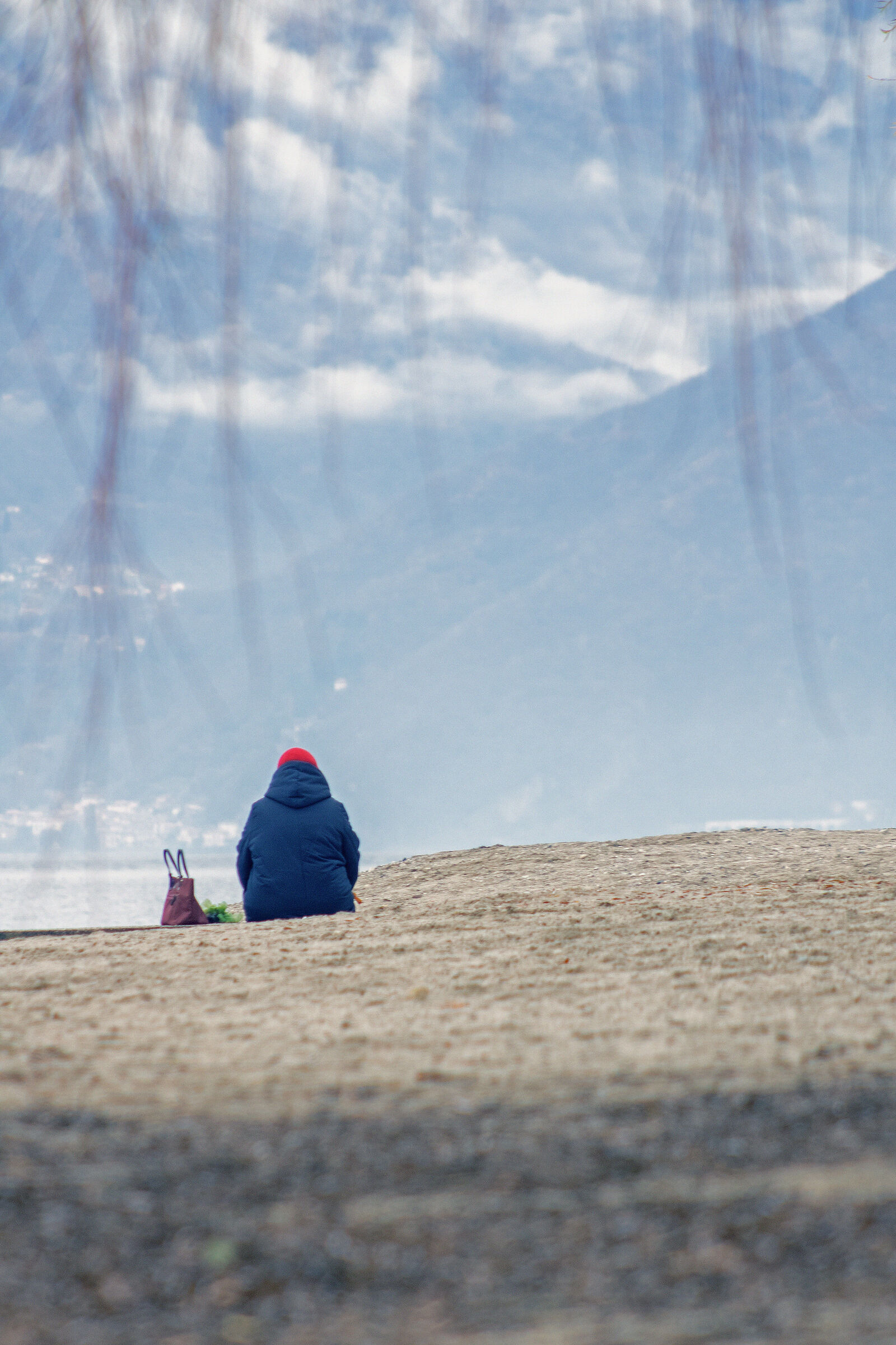 Old woman by the lake