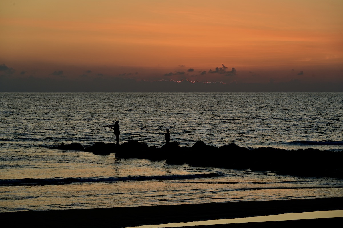 But in the shade of the last sun The catch had fallen asleep