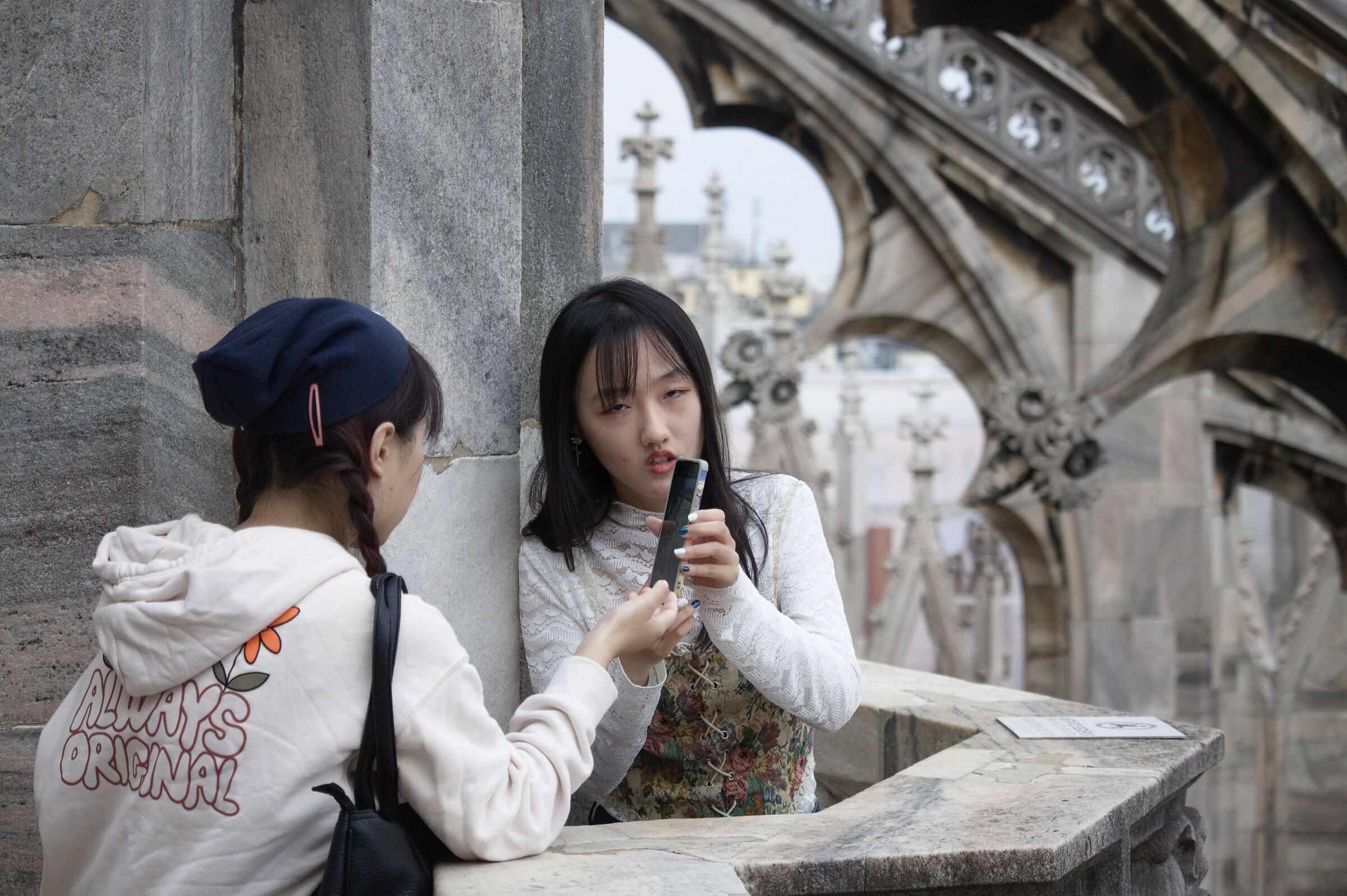 Tourists on the cathedral of Milan