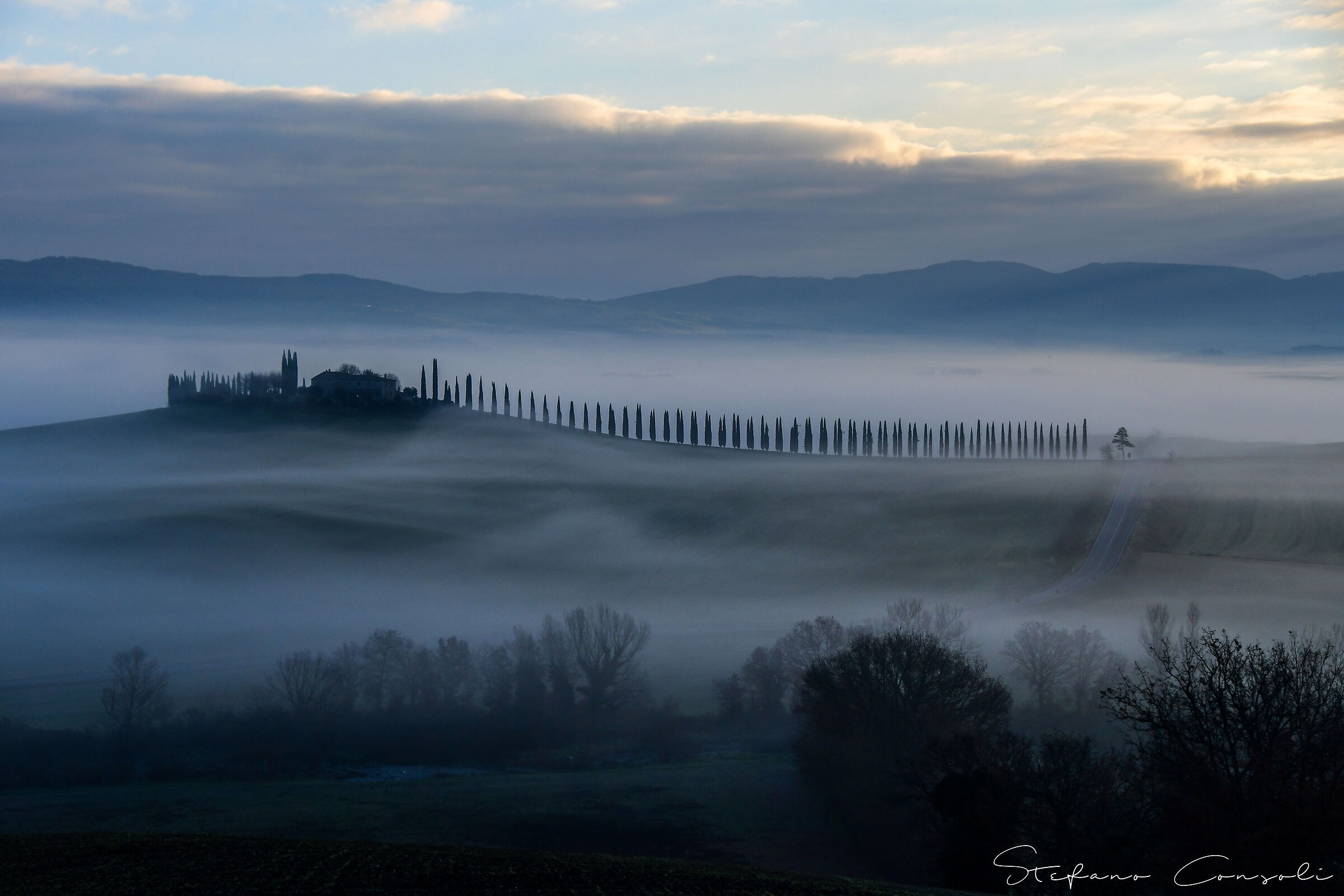 Poggio Covili at dawn with fog