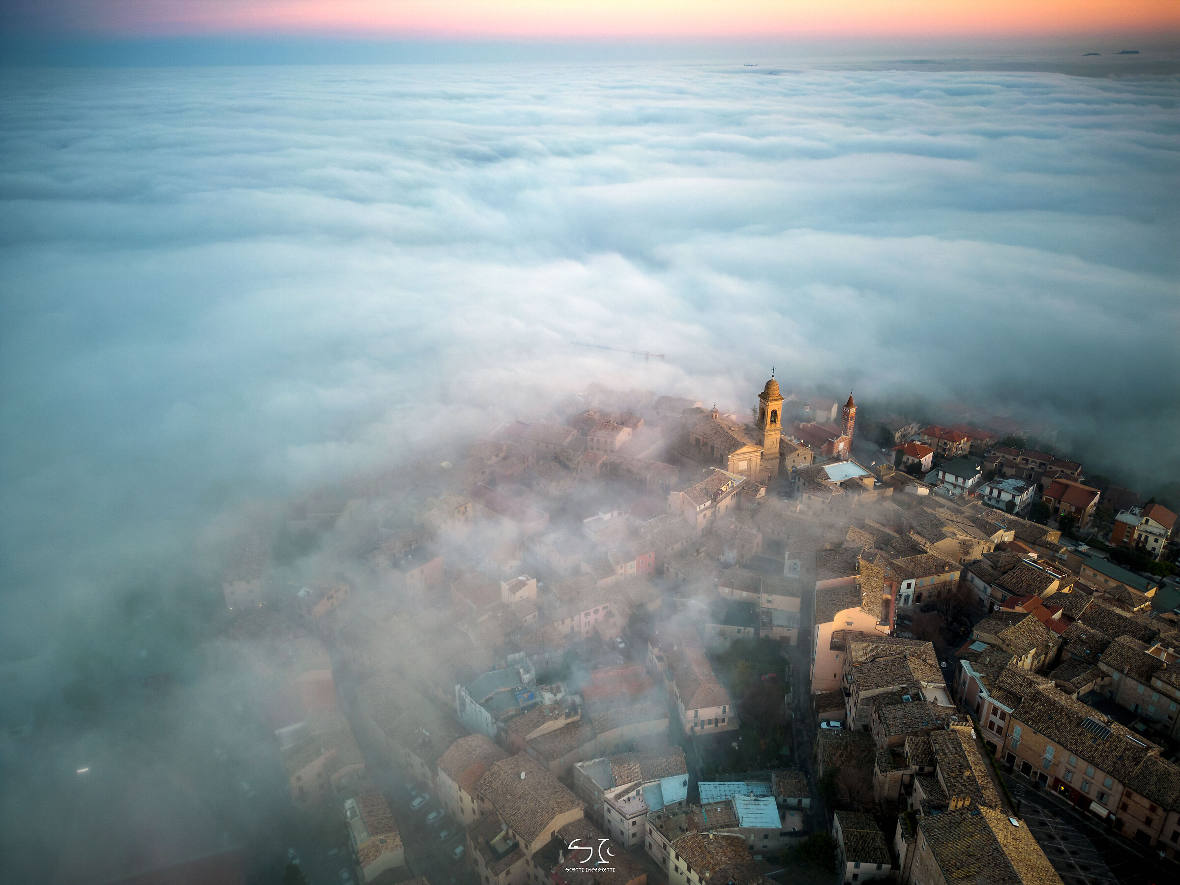Country submerged by fog