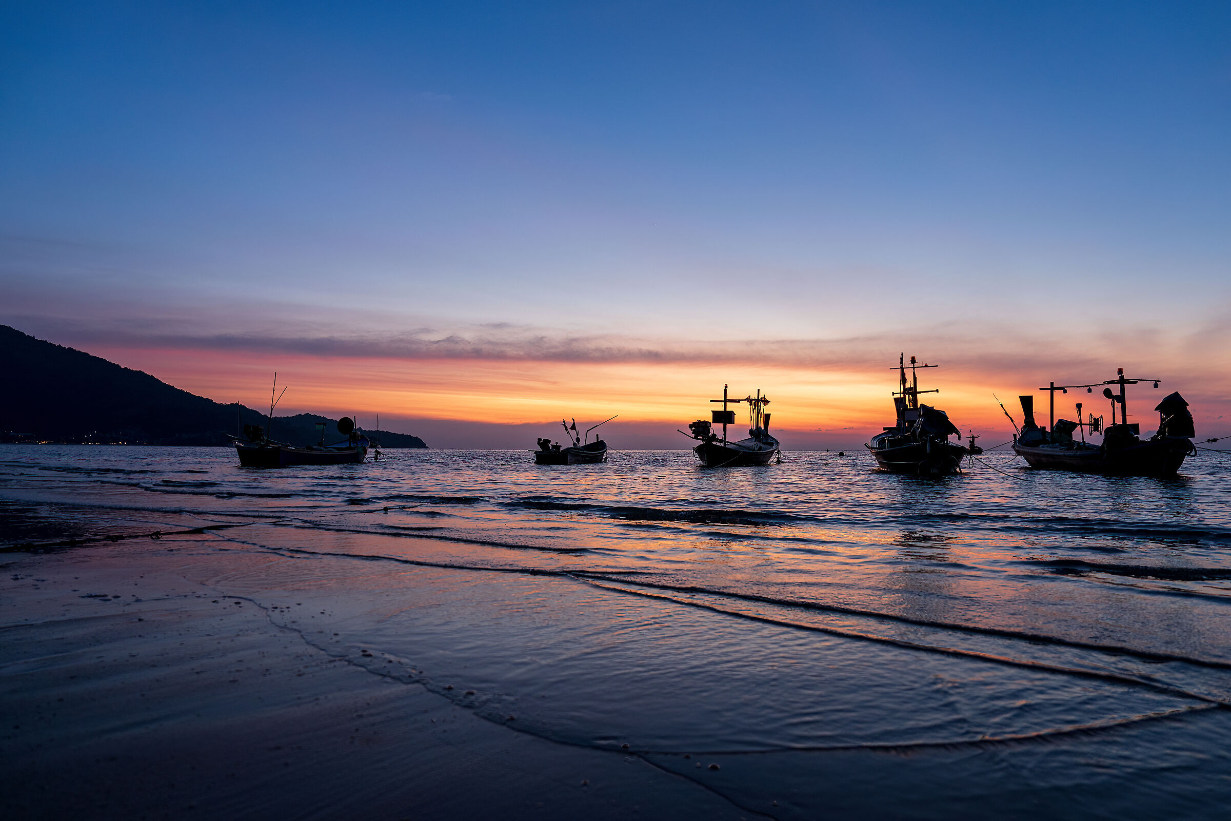 Boats on the beginning of the night