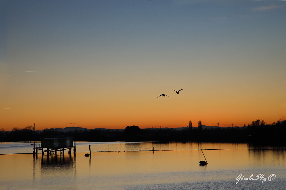 Comaccio- sunset over the valley