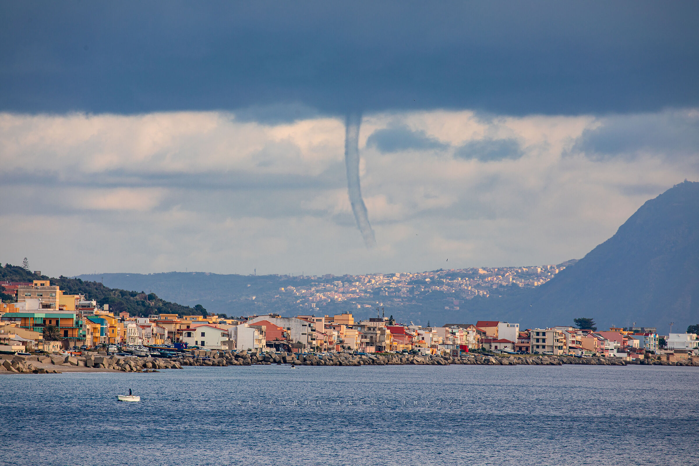 Tornado between Scylla and Charybdis