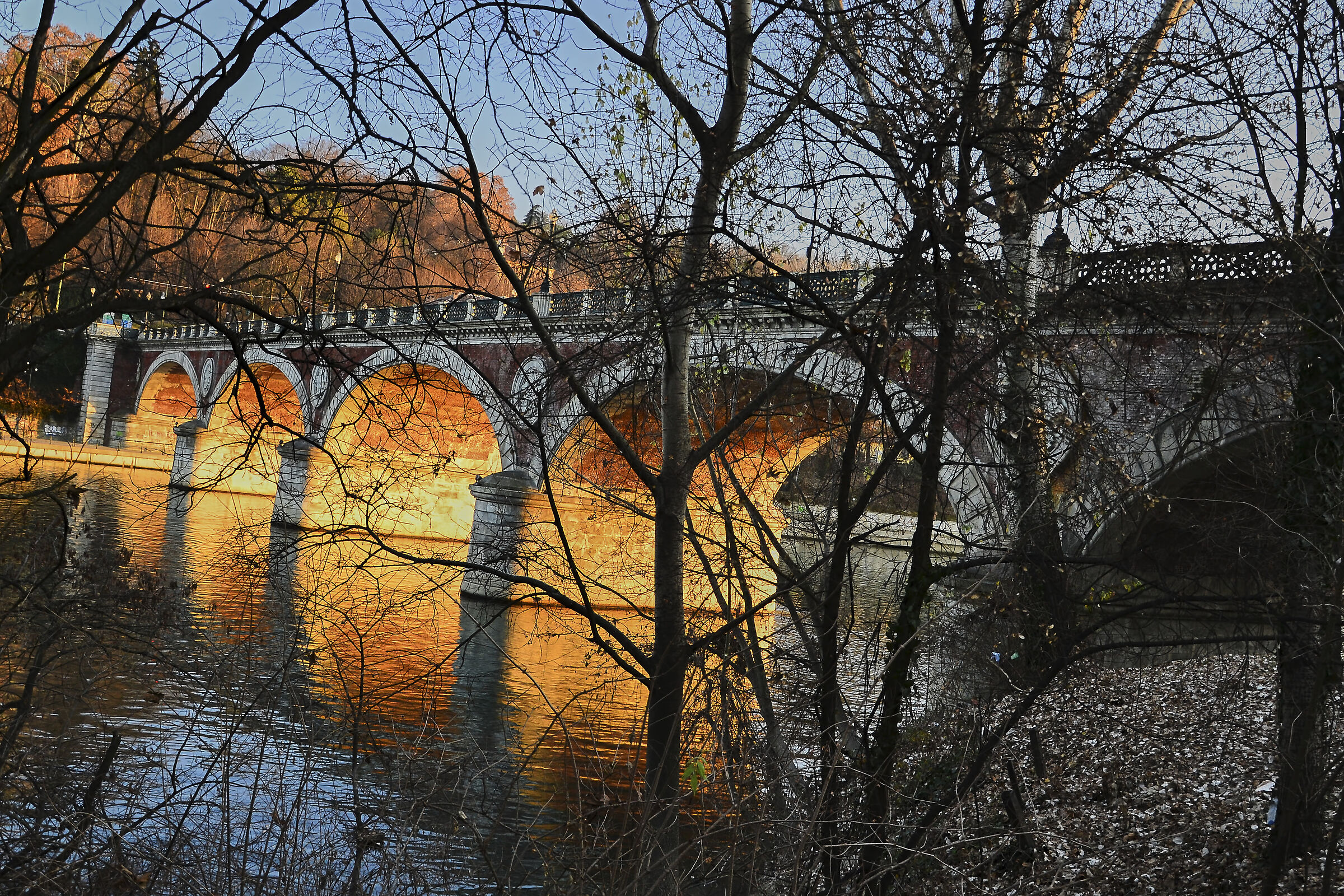 Reflections on the Po at sunset