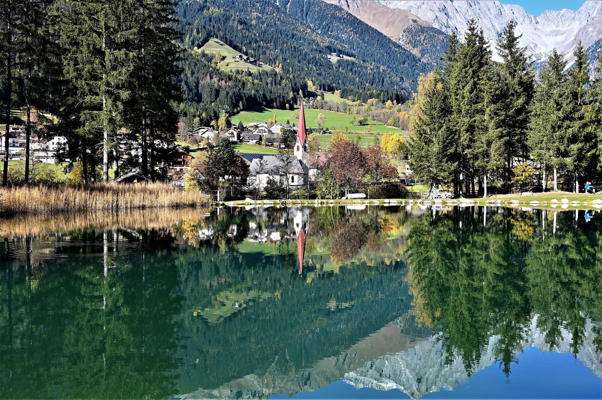 Rasun in the middle with its pond