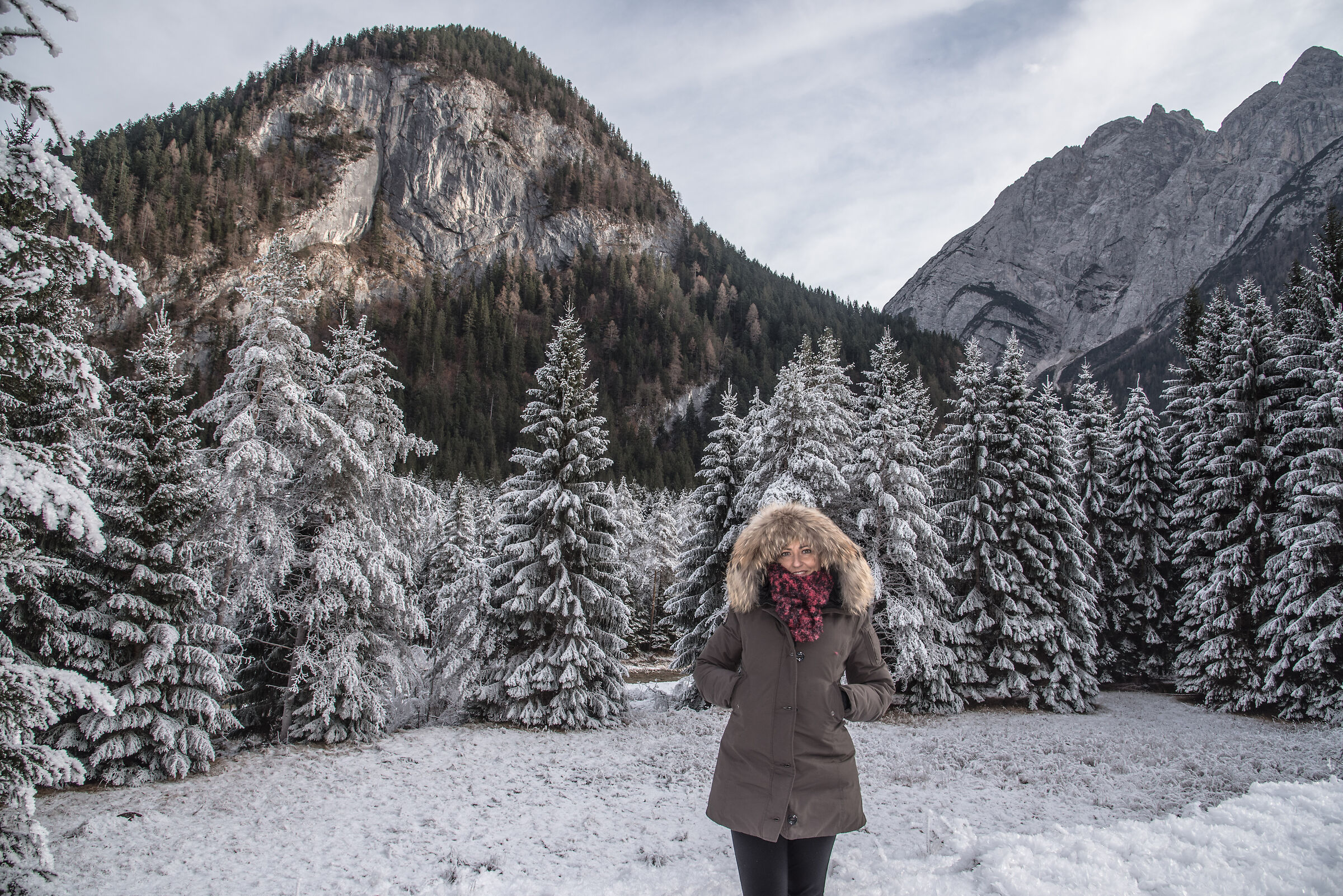 my wife immersed in the snowy landscape