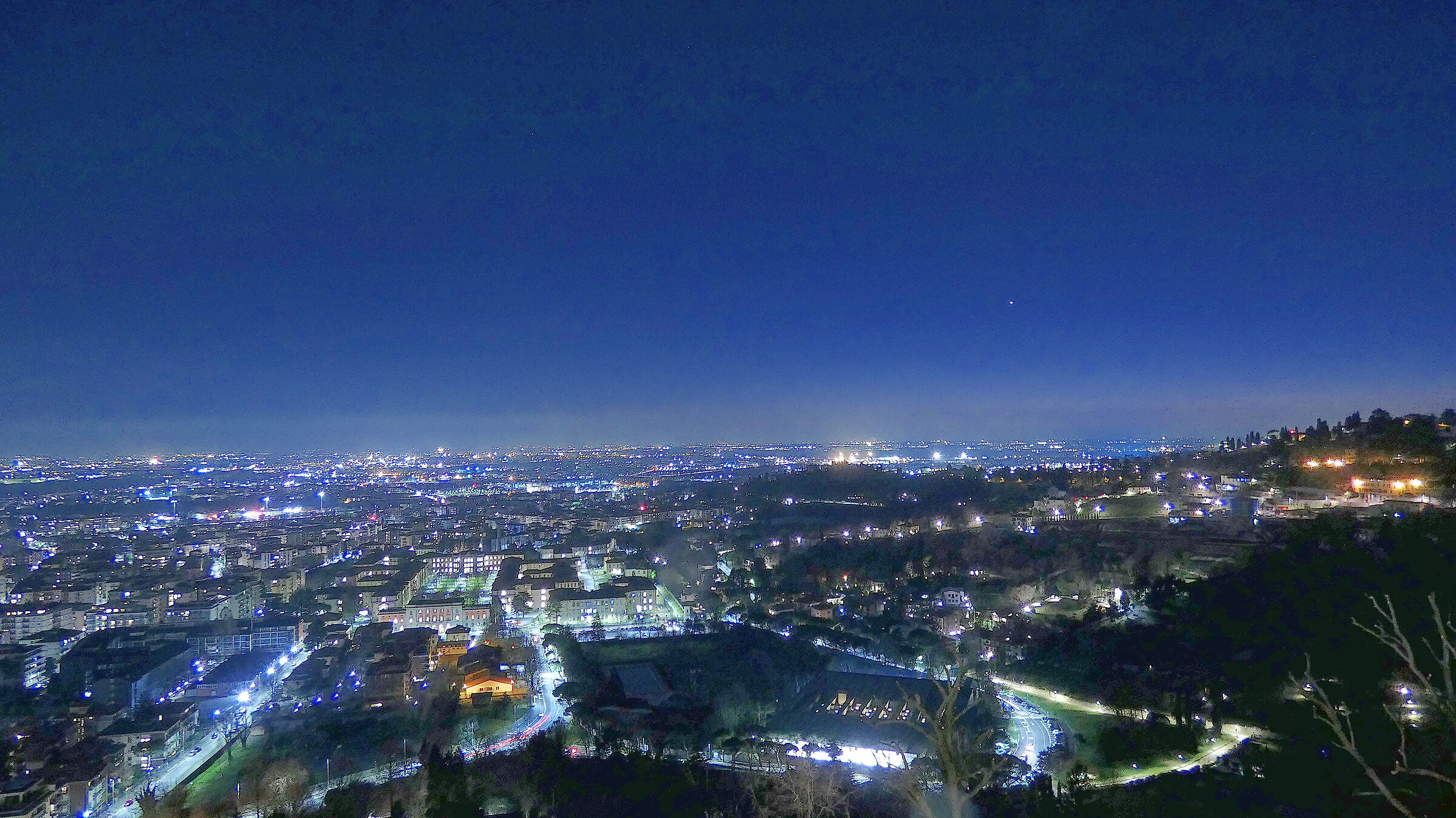Nocturnal Lombard plain from the walls of Bergamo Alta