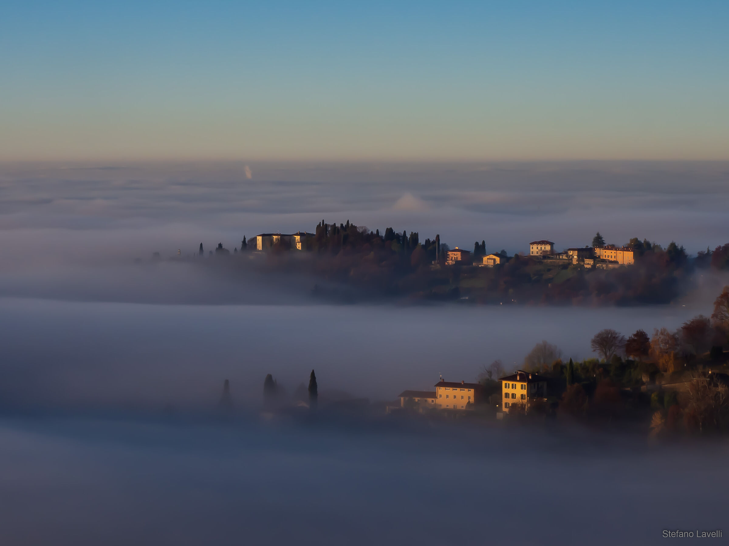 Like two islands on the sea of fog