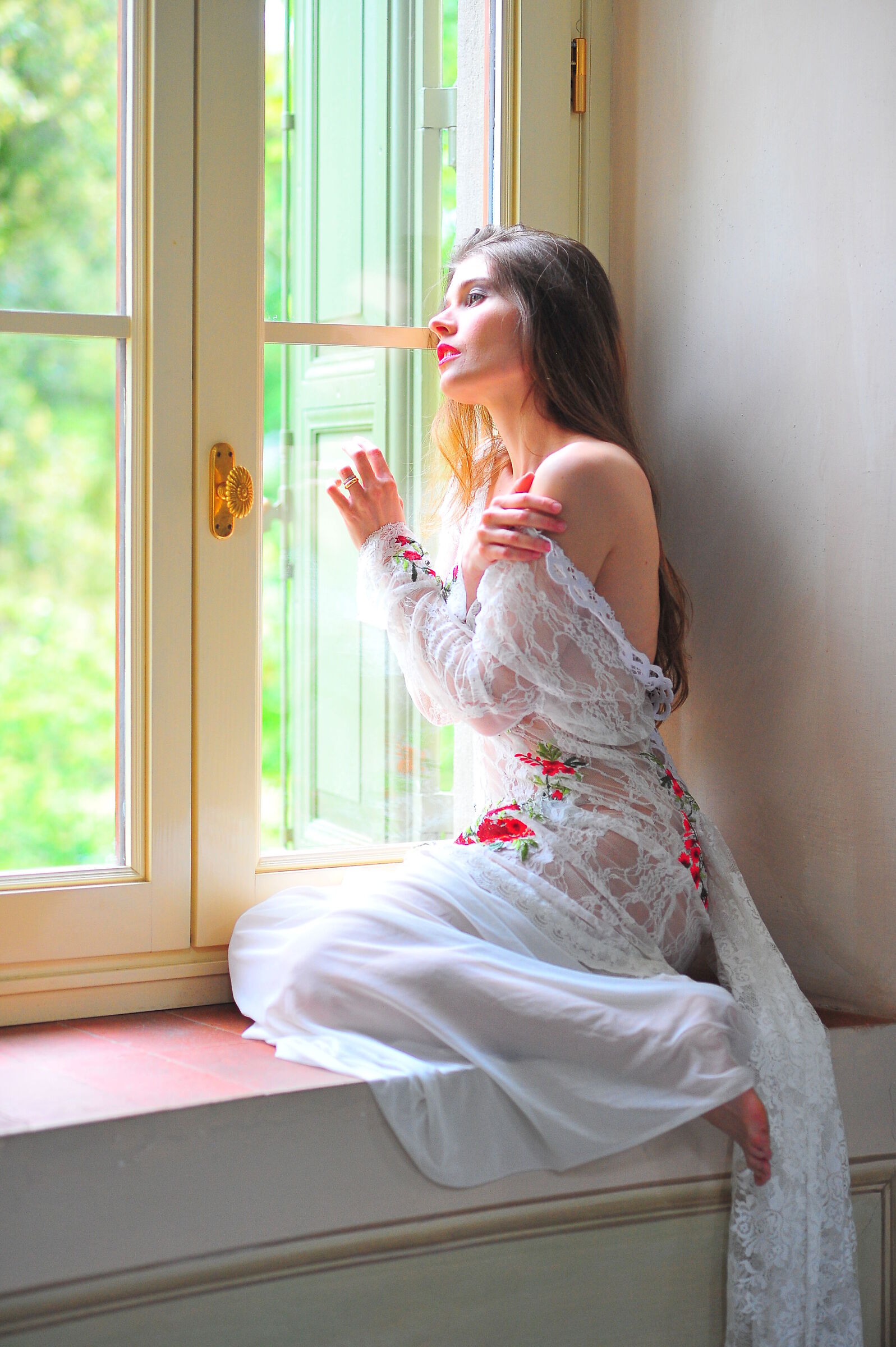 At the window...