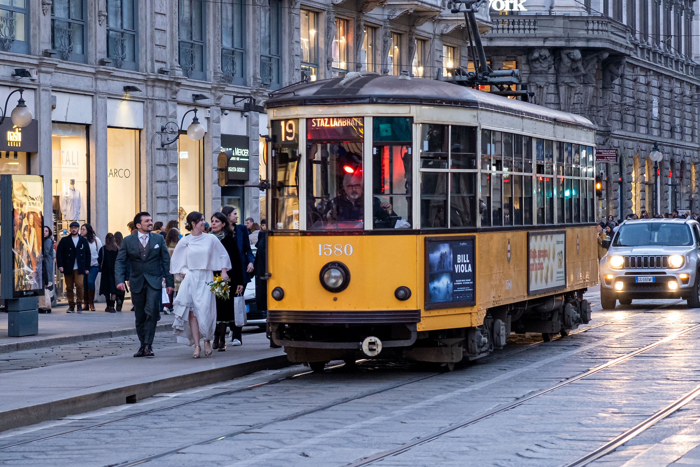 The bride and groom by tram