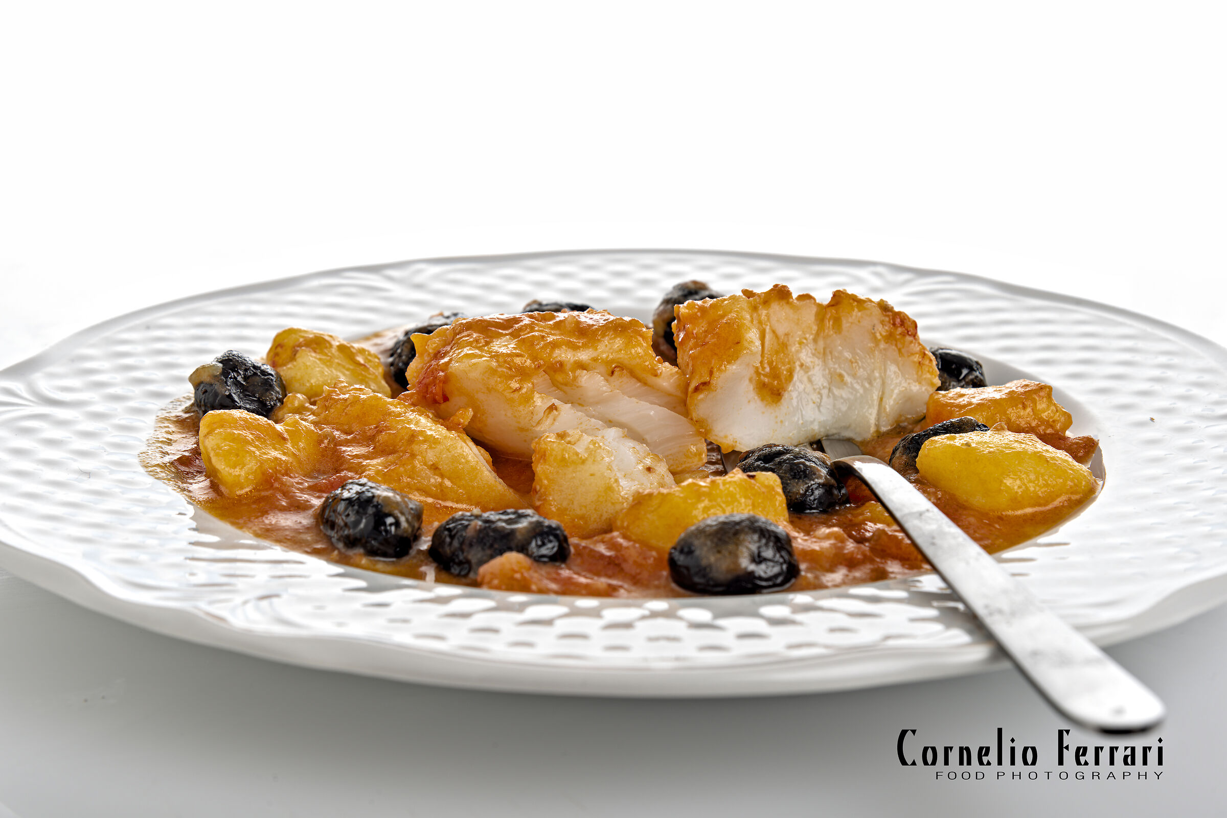 merluzzo al pomodoro con patate e olive nere