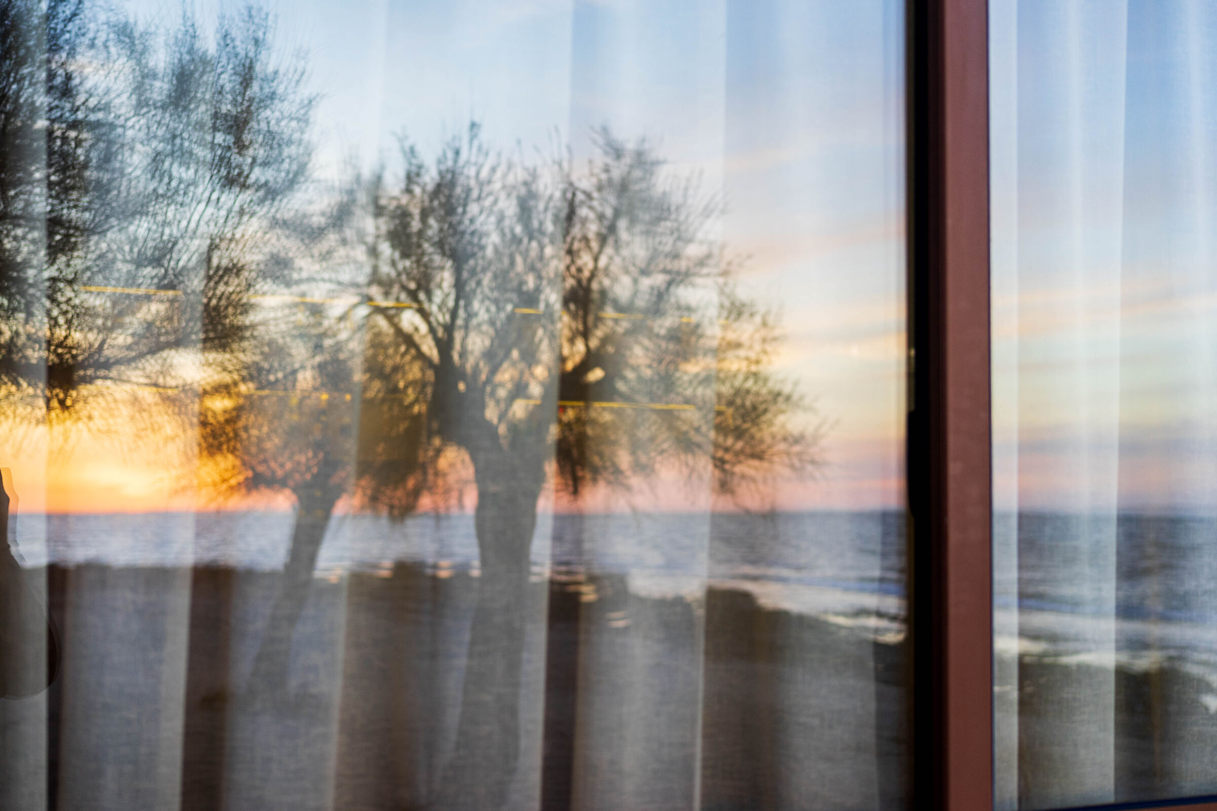 Tramonto alla finestra