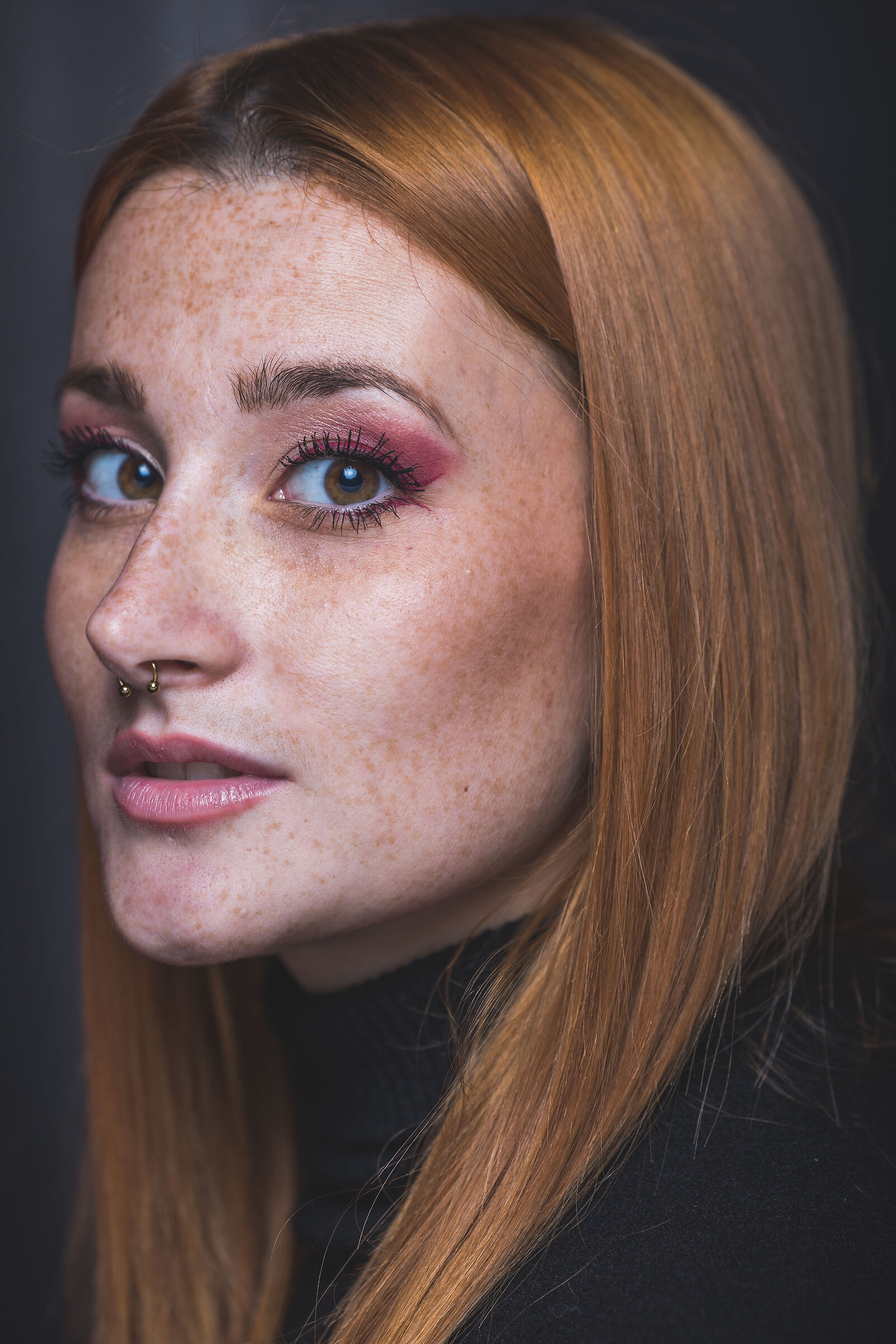 Margherita, a beautiful girl portrayed in the studio.