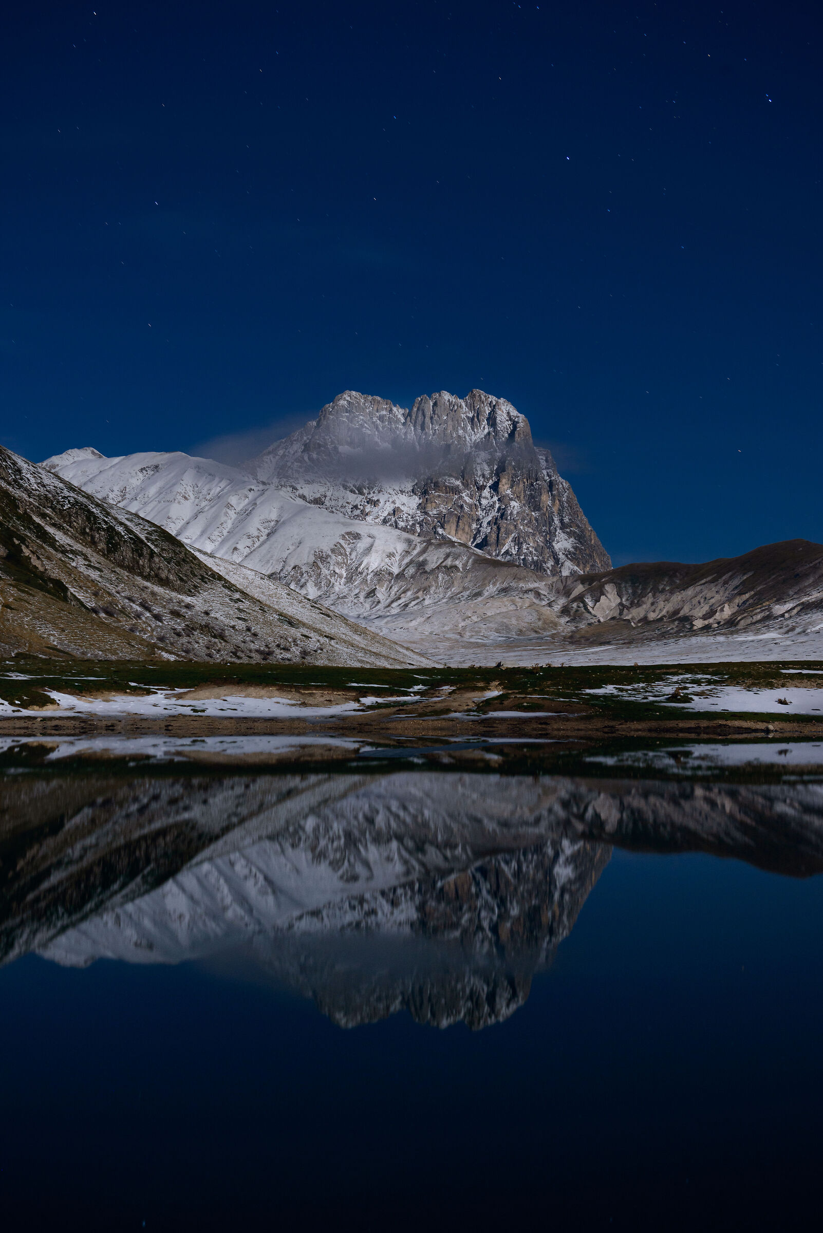 Lake Pietranzoni and his Majesty the Gran Sasso at night