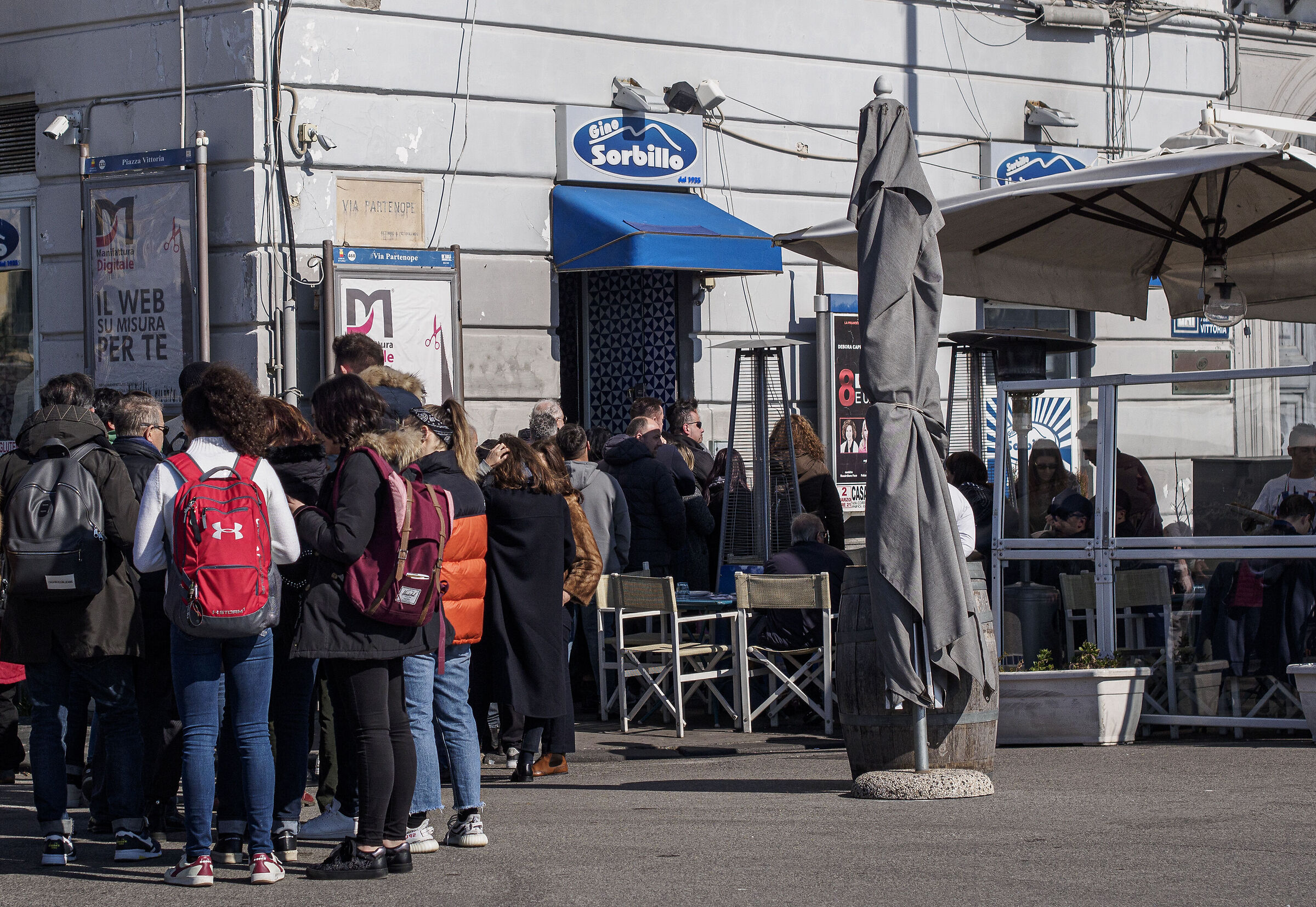 Queue for a pizza on the waterfront