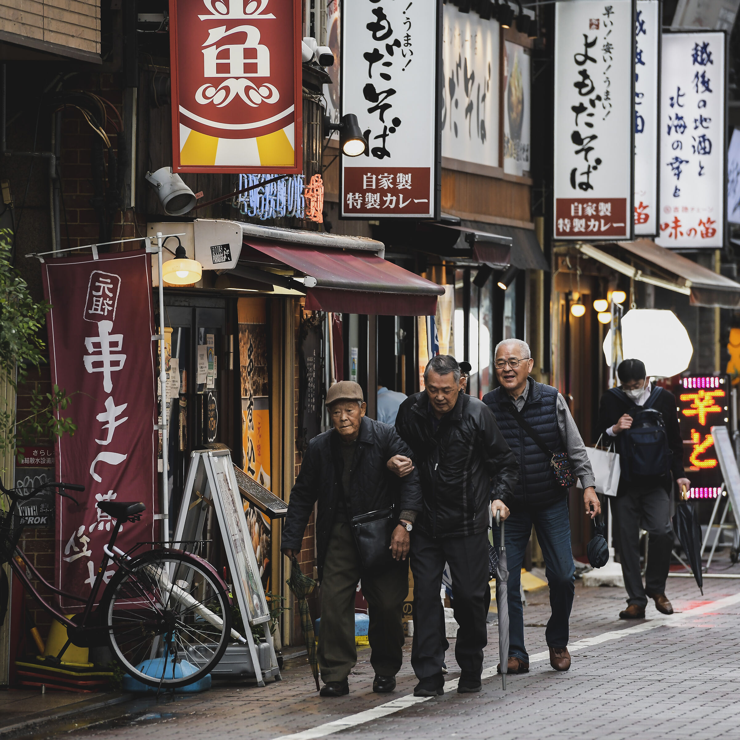 Three men and one leg