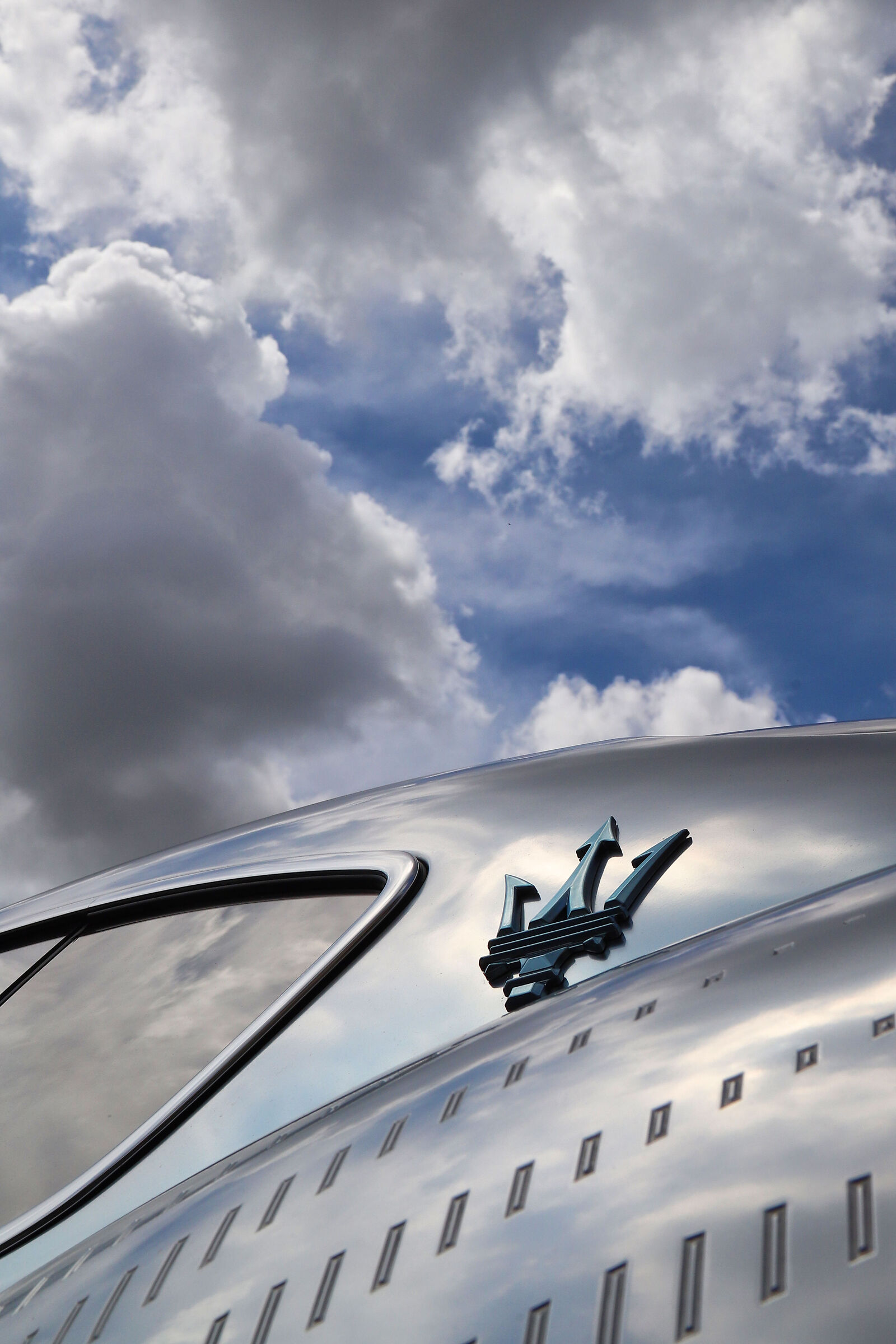 Maserati car logo in the sky, Modena, may 2023