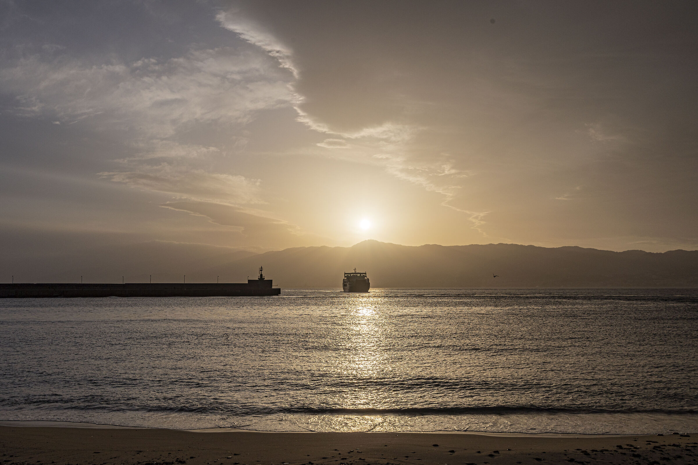 The coast of Messina at sunset