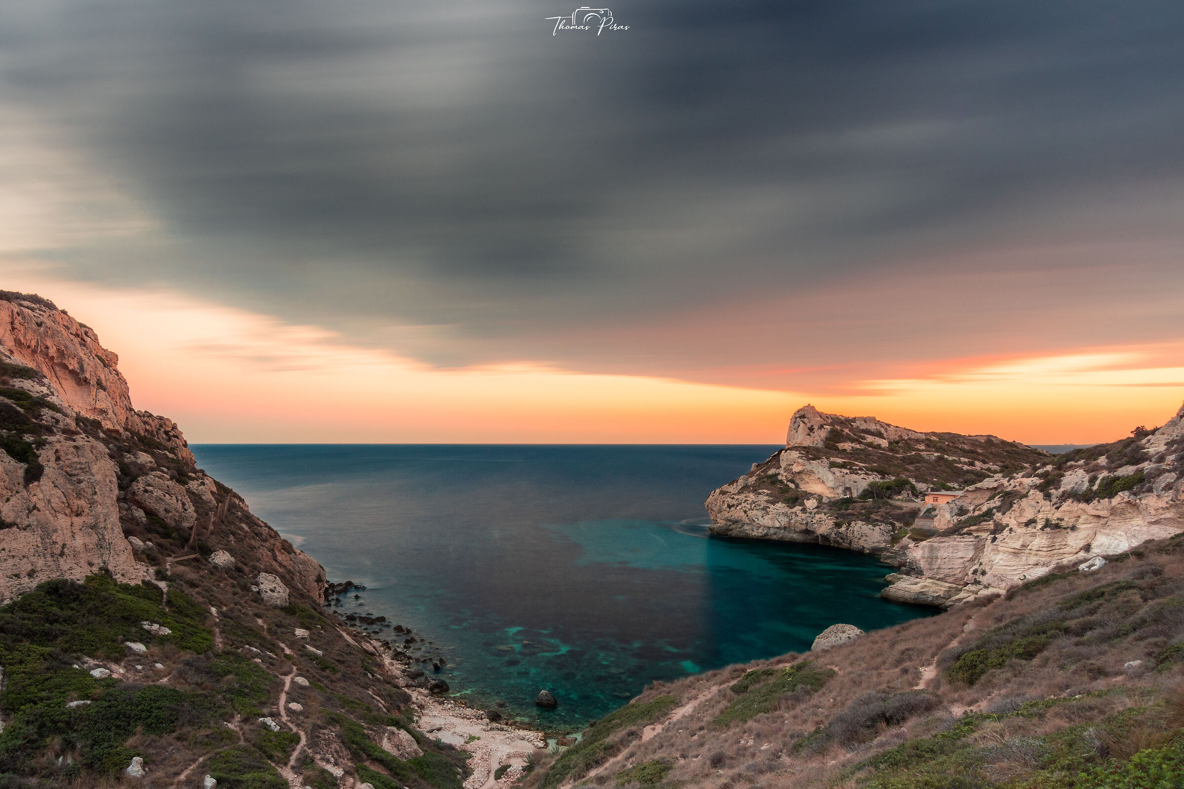 Cala Fighera at sunset