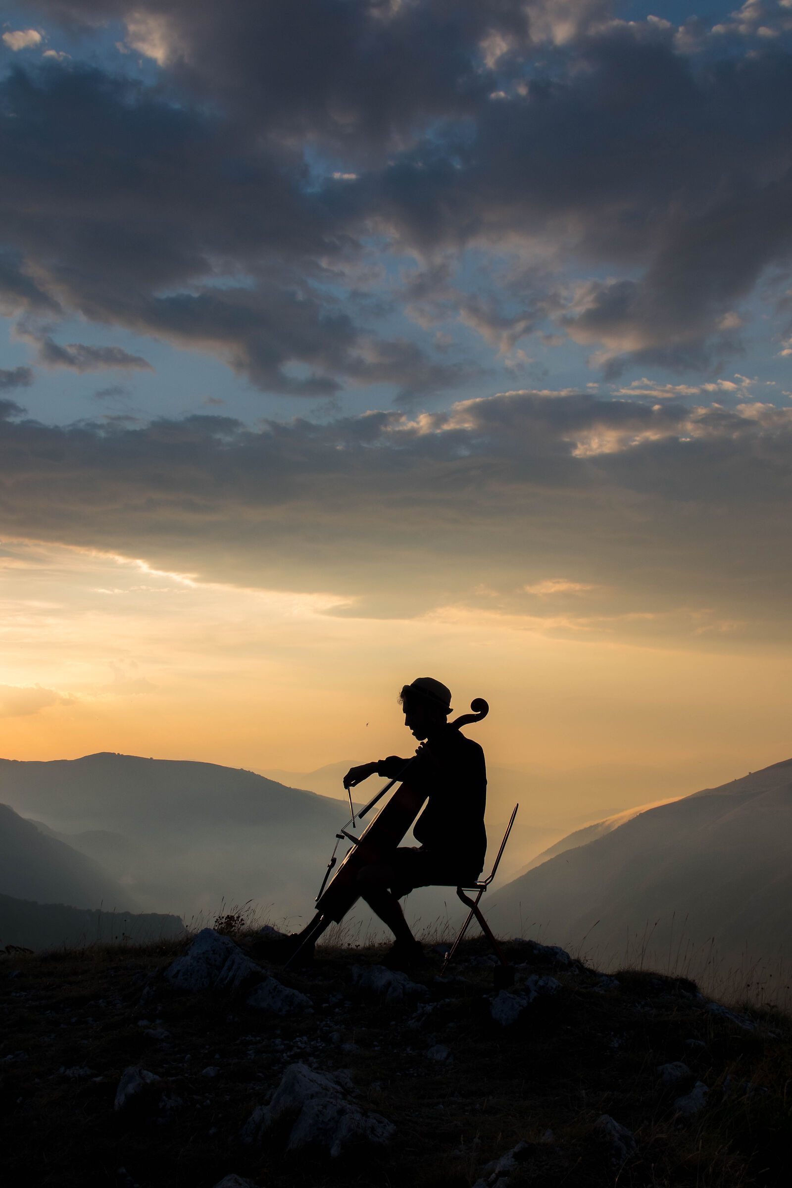 Cellist in the clouds 2
