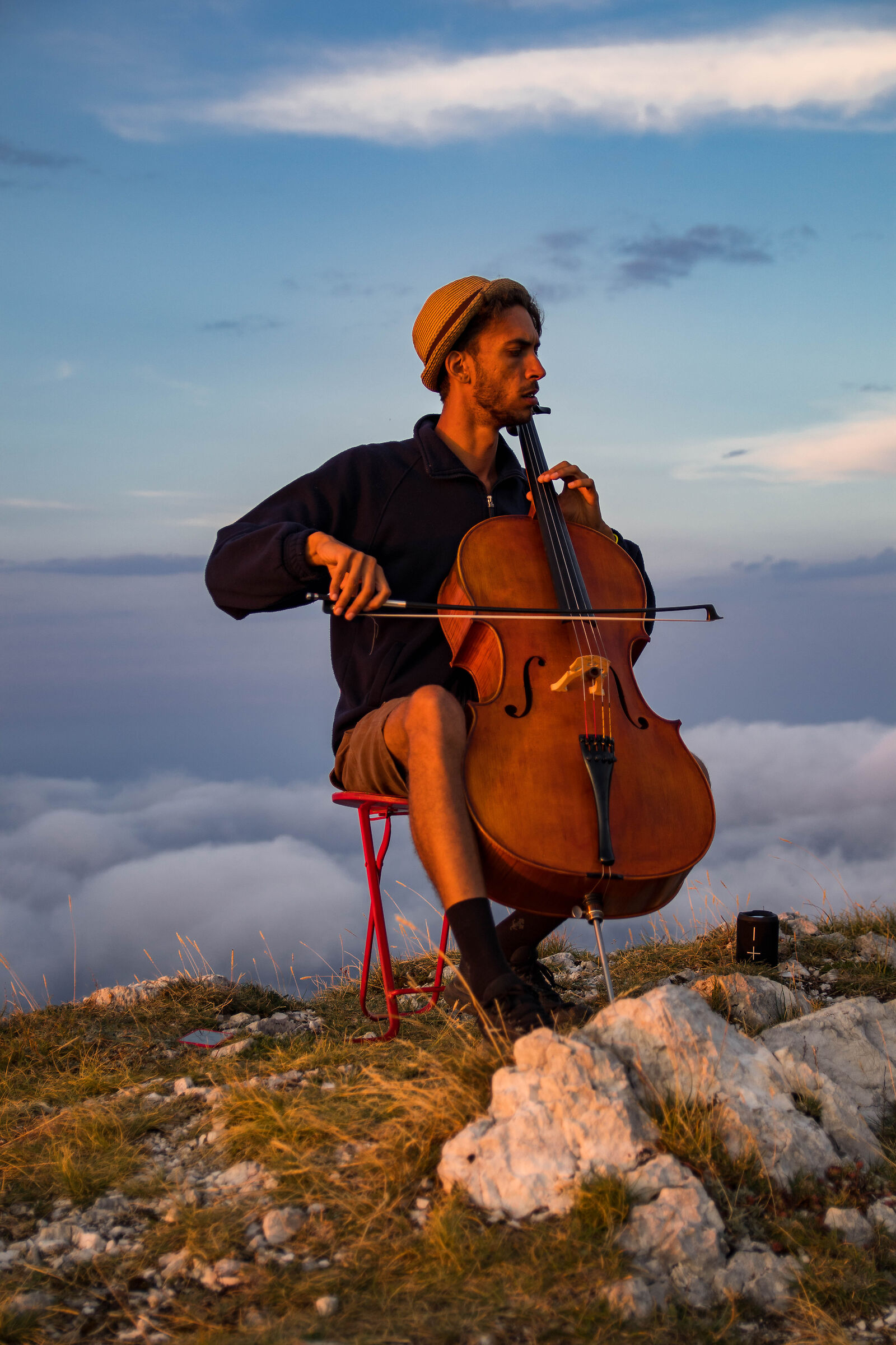 Cellist in the clouds 3