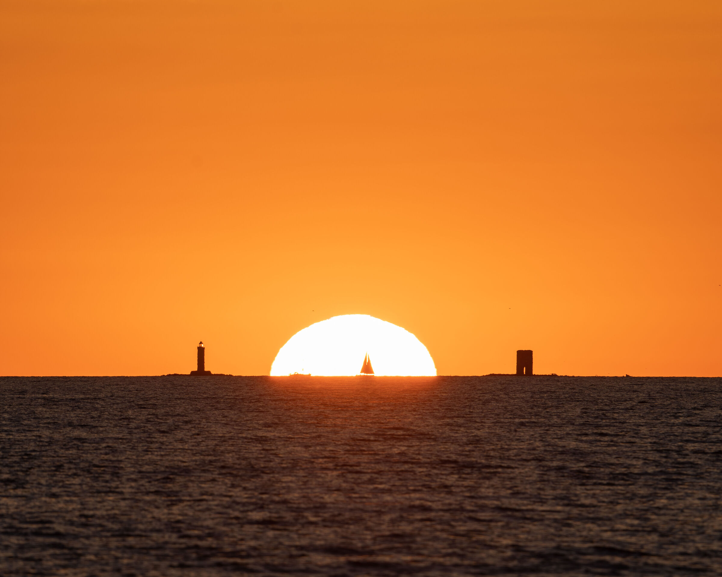 Sunset between two pillars