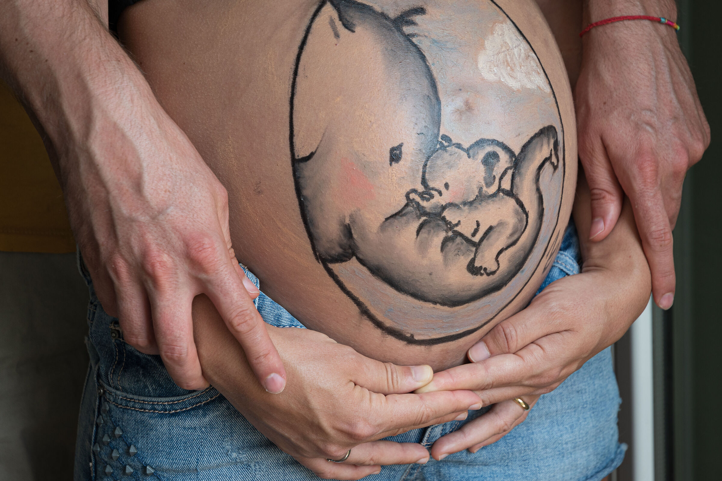 Embraced by parents