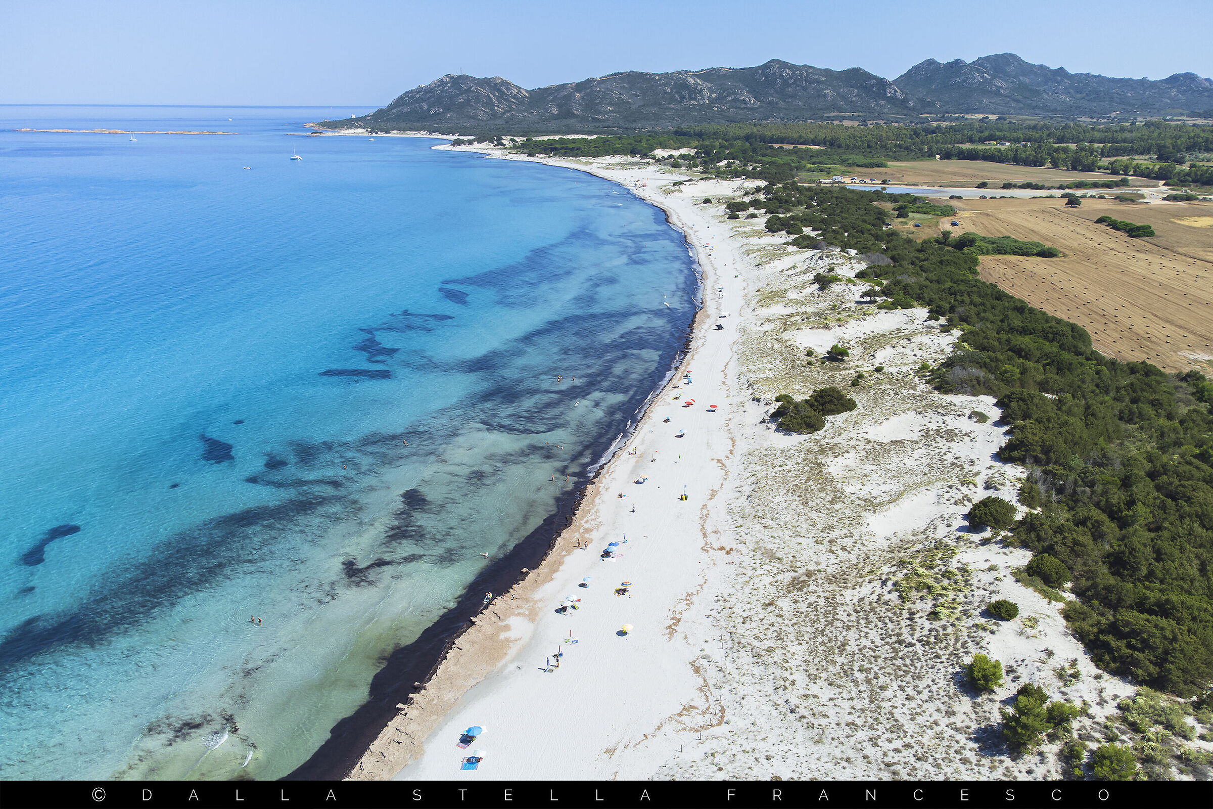 Capo Comino and the beach of the Dunes