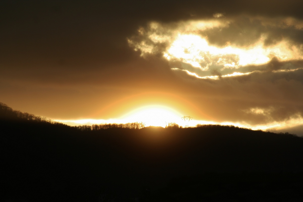 Explodes behind the mountain