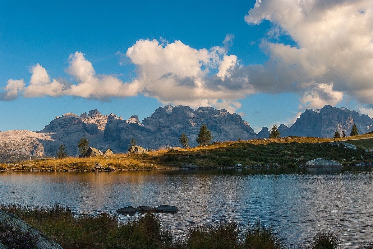 Brenta mountains at sunset from the lake Predalago