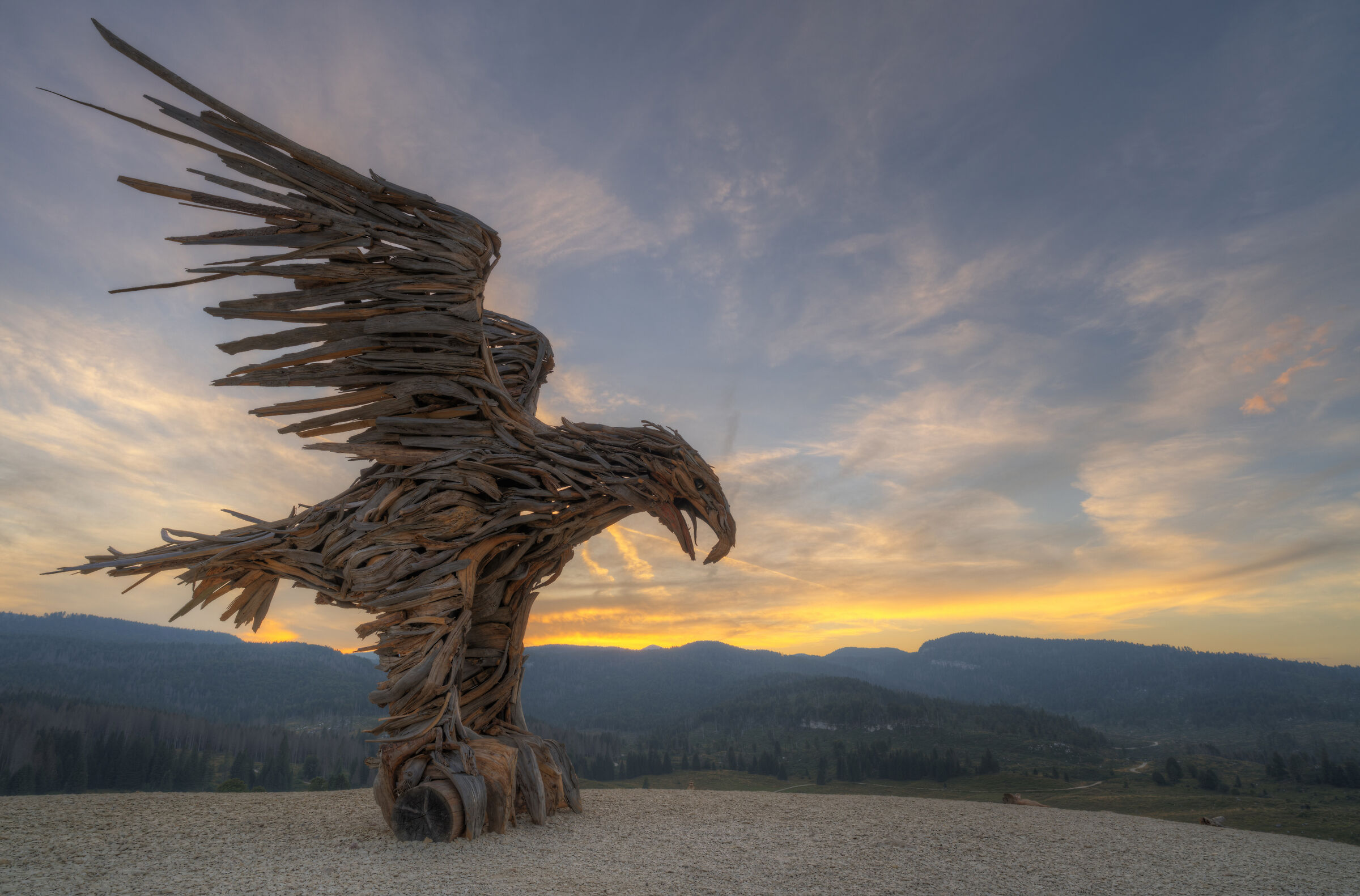 Fiery sunset, the eagle of Marcesina