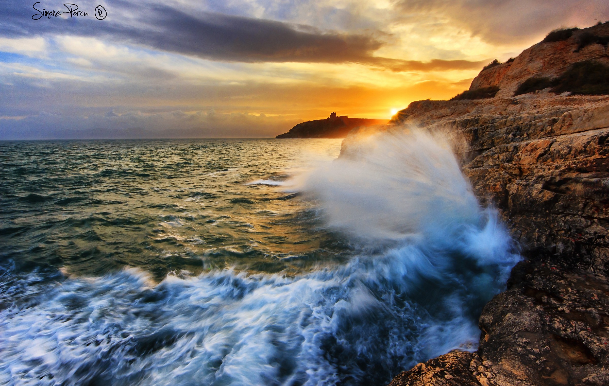Cagliari - sunset, waves and rocks