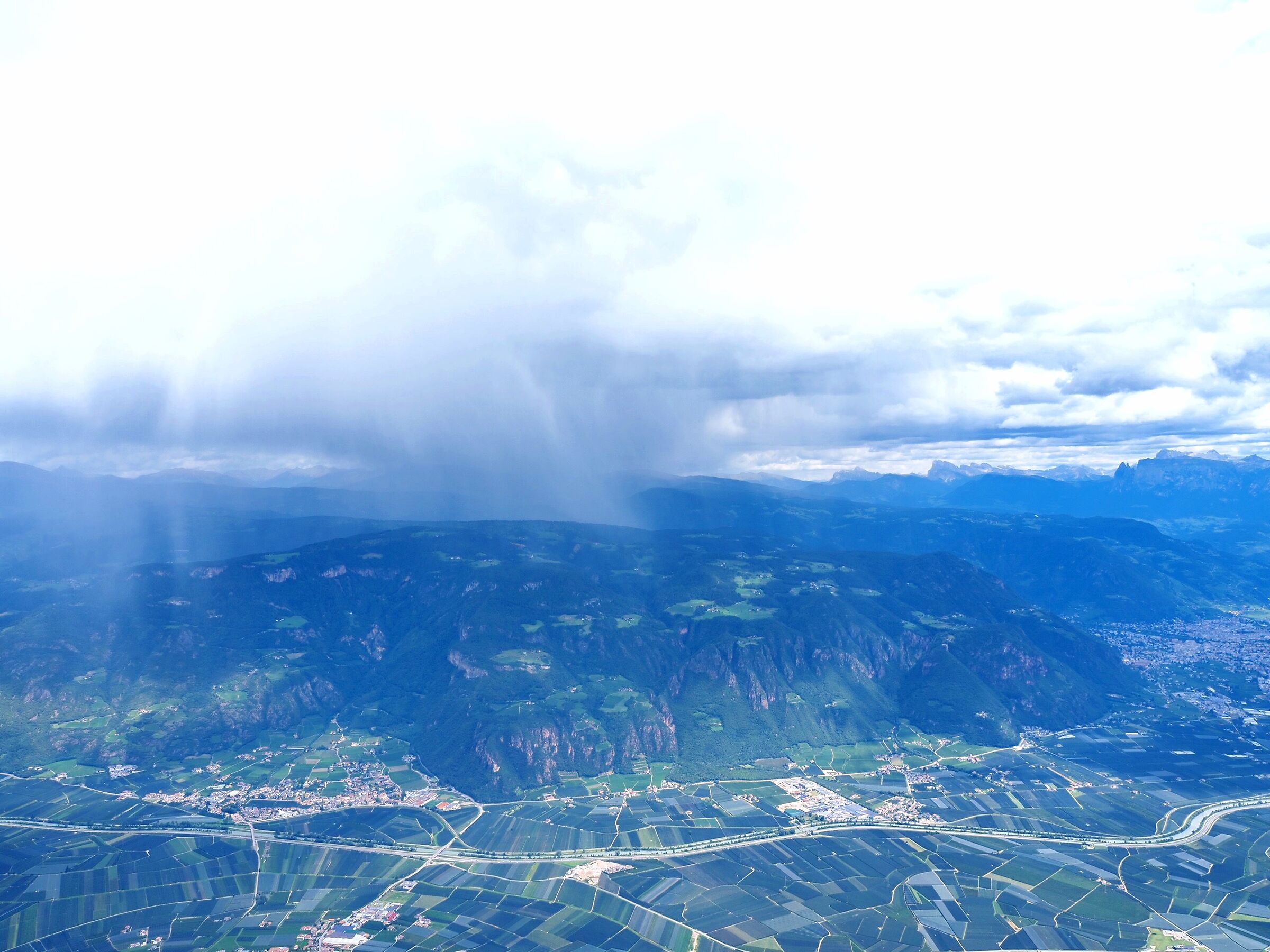 The valley and the distant storm