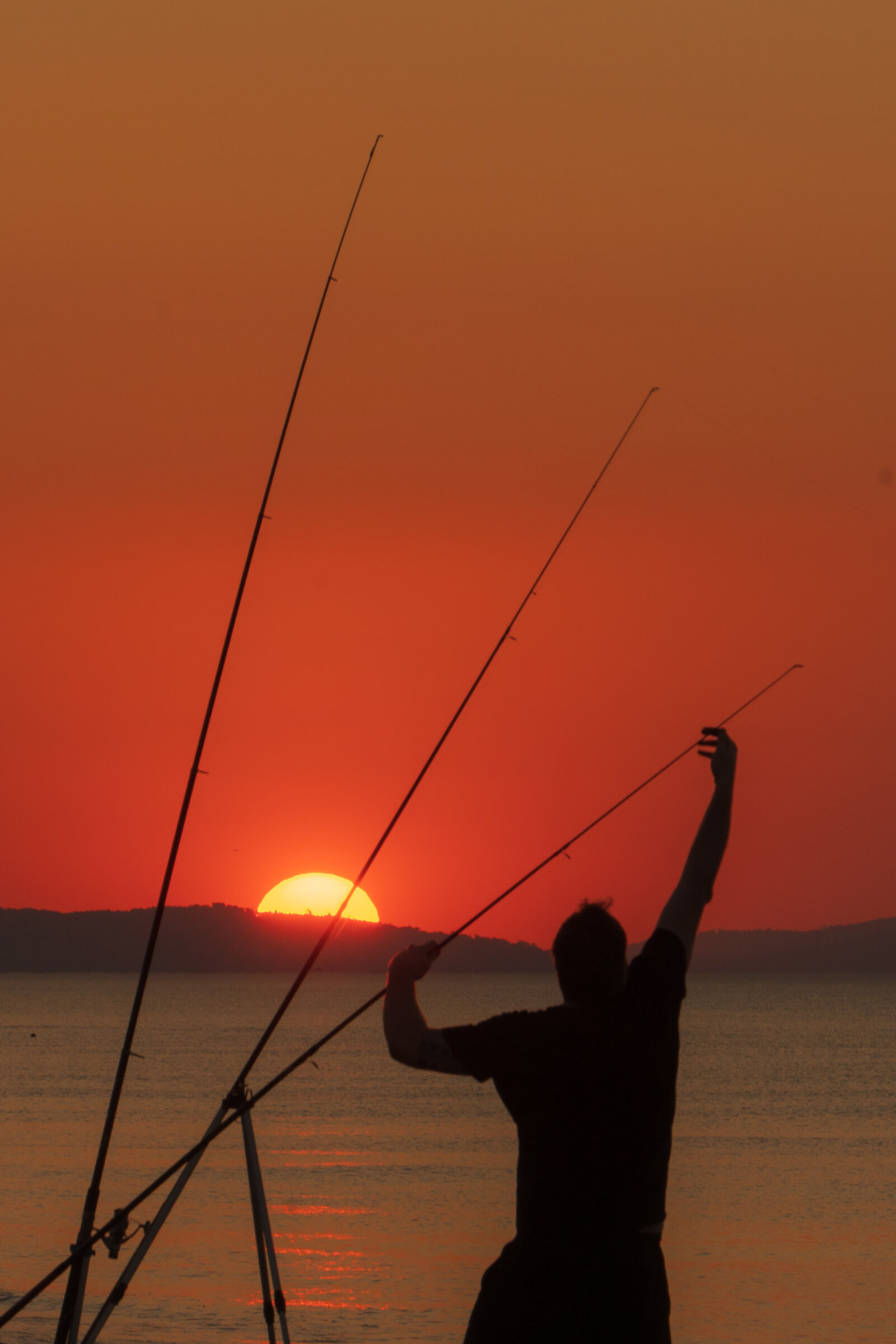 Fishing at the sunset